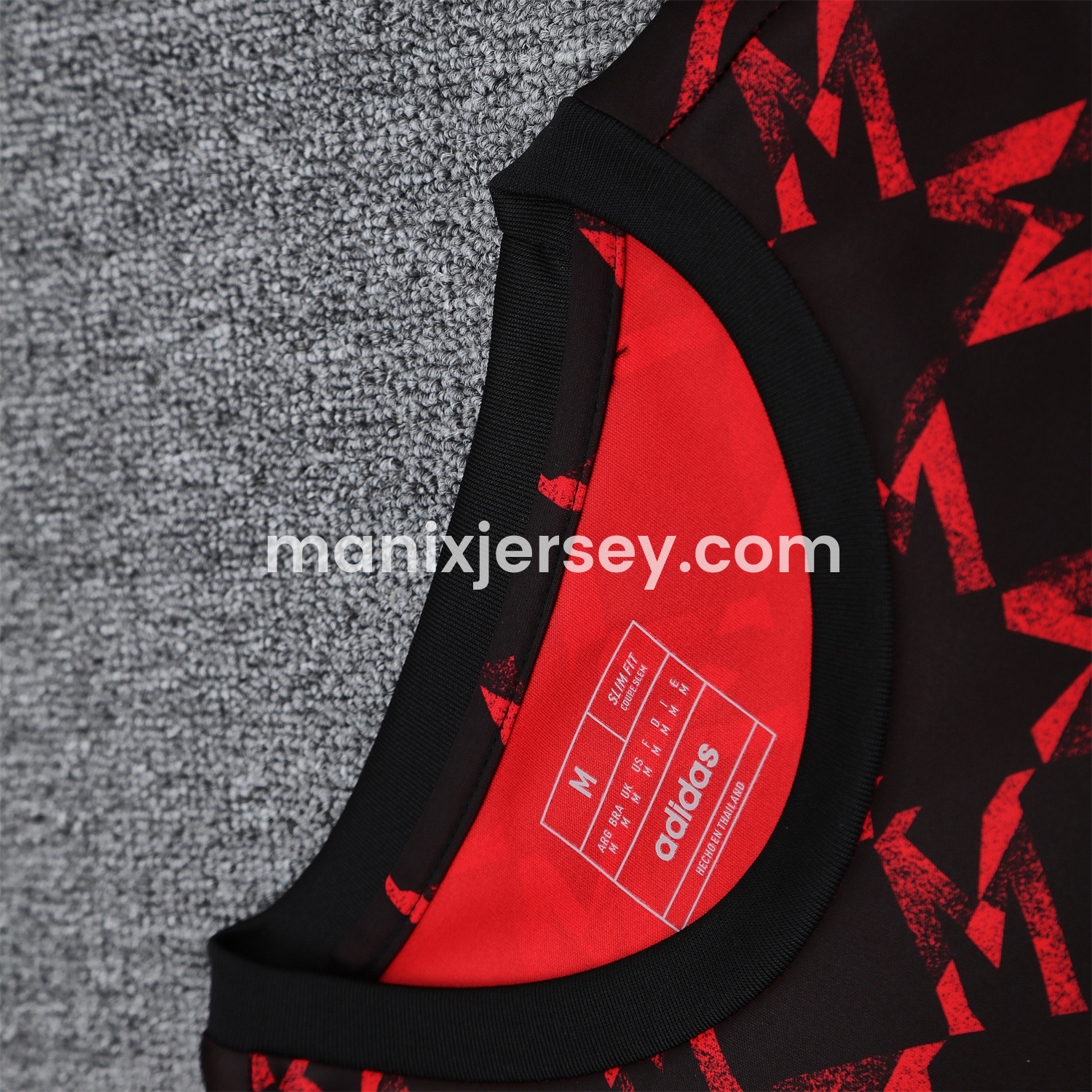 ManixJersey.com | Manchester United 25-26 Pre-Match Short-Sleeve Training Set - Red Top & Black Shorts -Customize Name, Number and Patch | Worldwide Shipping