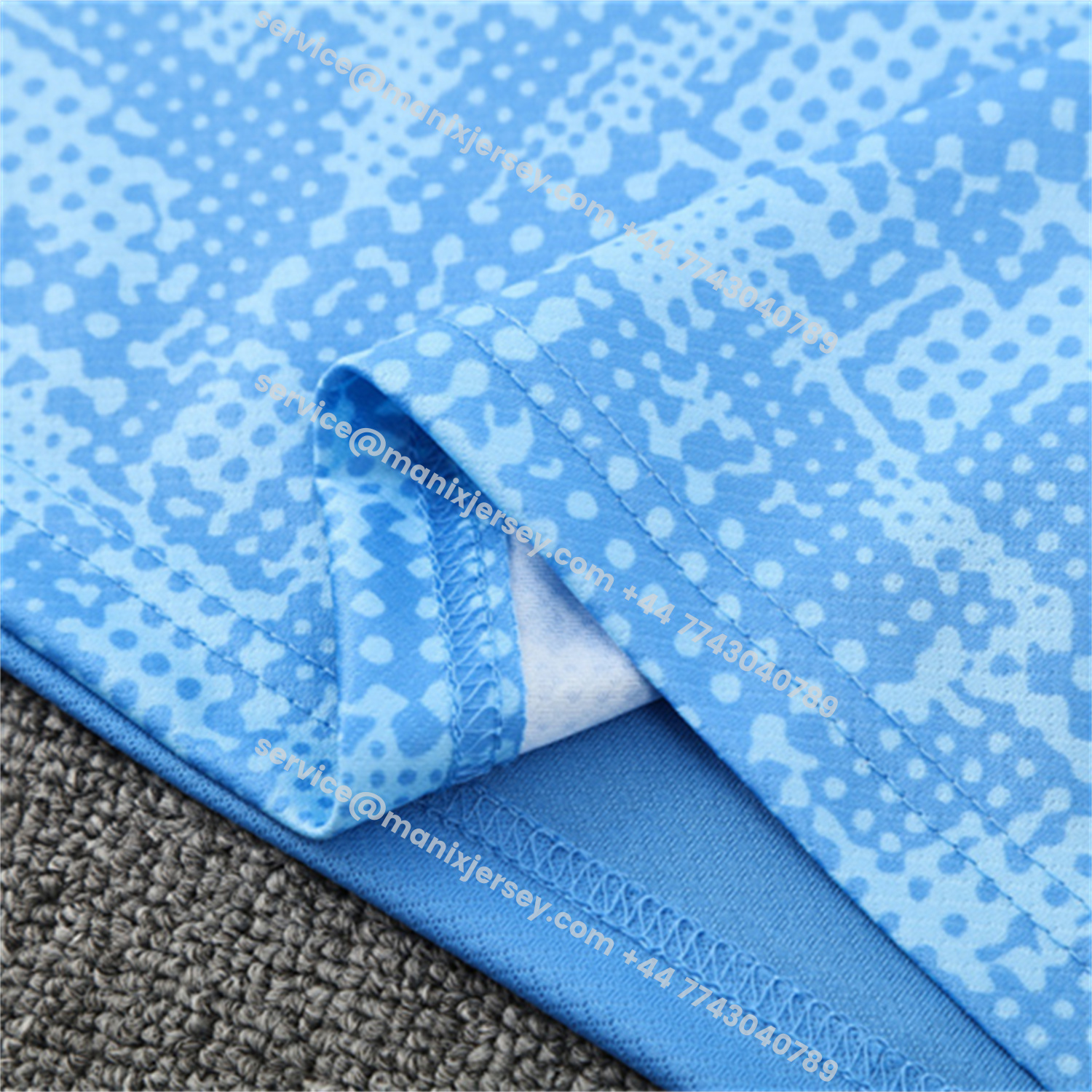 ManixJersey.com | Manchester City 25-26 Kids Short-Sleeve Training Set - Light Blue Camouflage Top & Deep Blue Shorts -Customize Name, Number and Patch | Worldwide Shipping