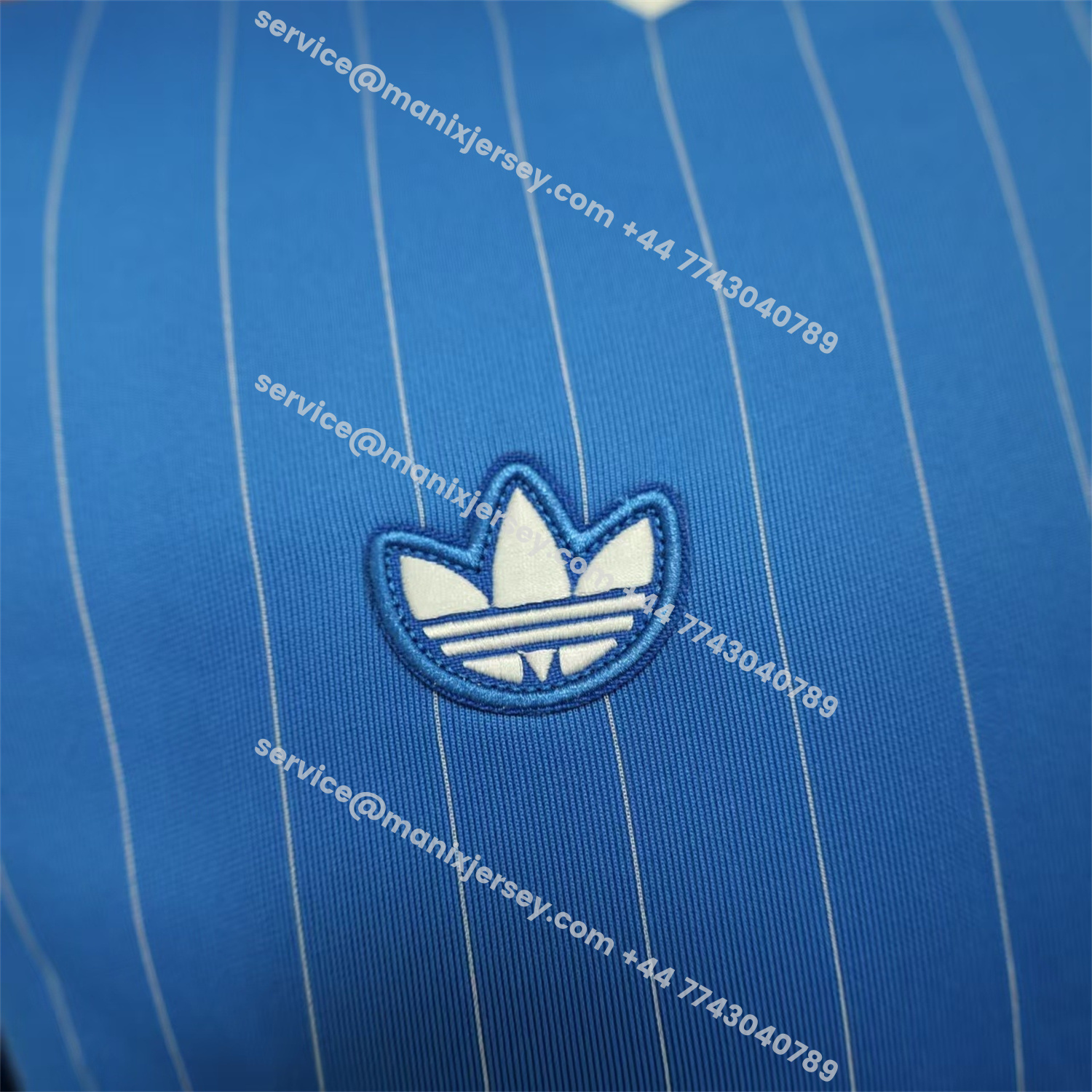 ManixJersey.com | Real Madrid 25-26 Trefoil White Lines Blue Travel Jersey - Player Version -Customize Name, Number and Patch | Worldwide Shipping