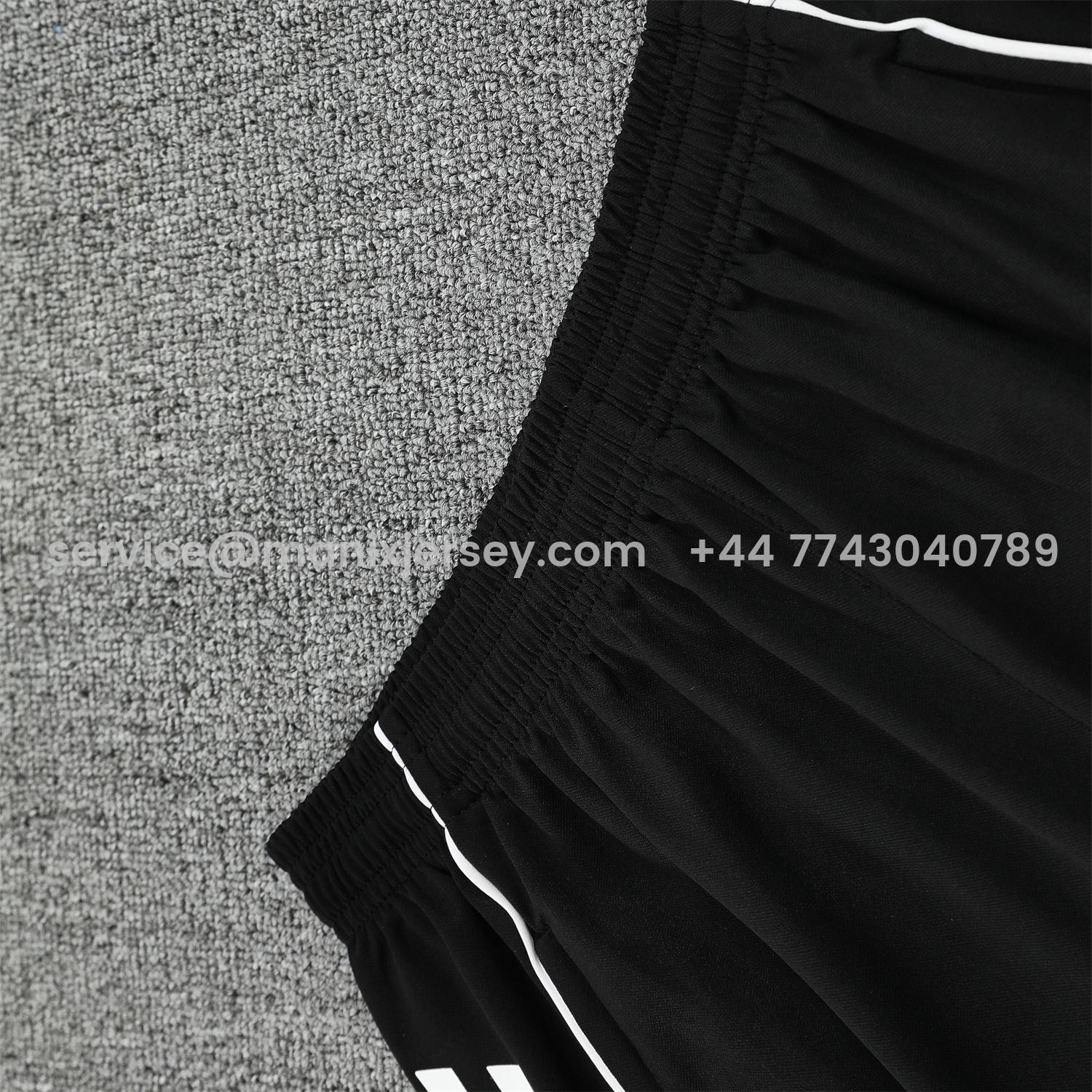 ManixJersey.com | Real Madrid 25-26 Short-Sleeve Training Set - Pink Arrow Pattern Top & Black Shorts -Customize Name, Number and Patch | Worldwide Shipping