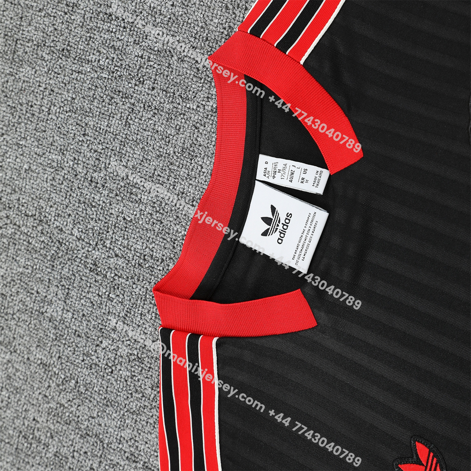ManixJersey.com | Manchester United 25-26 Short-Sleeve Training Set - Red Lines Black Top & Black Shorts -Customize Name, Number and Patch | Worldwide Shipping