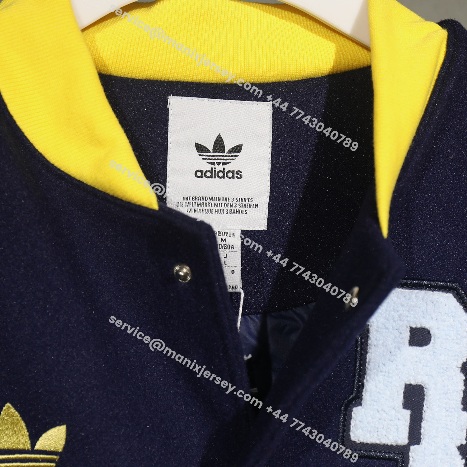 ManixJersey.com | Real Madrid 25-26 Warm Windbreaker Jacket - Dark Blue And White -Customize Name, Number and Patch | Worldwide Shipping