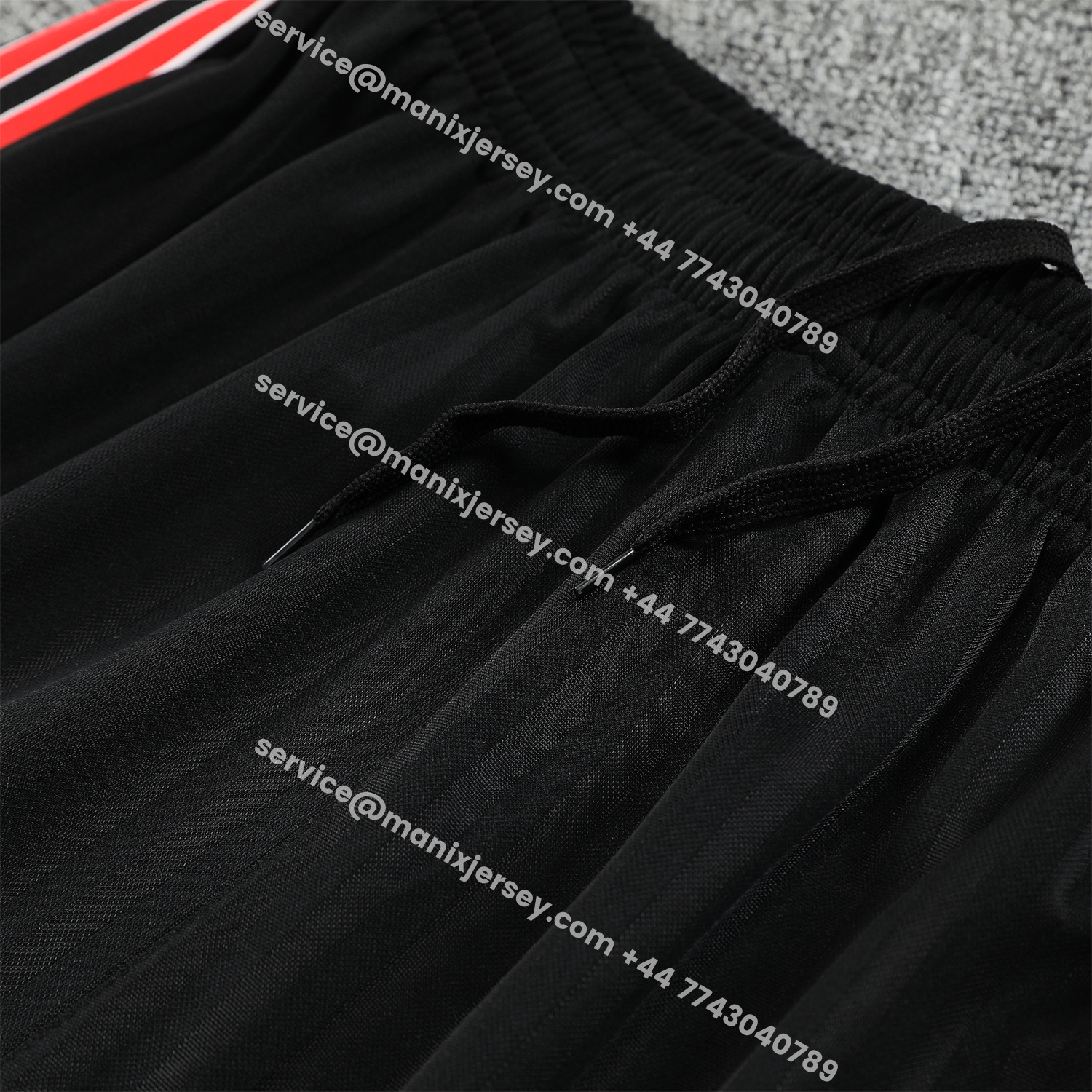 ManixJersey.com | Manchester United 25-26 Short-Sleeve Training Set - Red Lines Black Top & Black Shorts -Customize Name, Number and Patch | Worldwide Shipping
