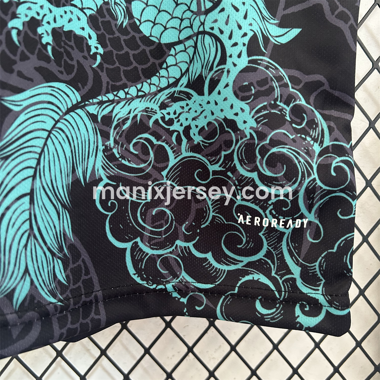 ManixJersey.com | Real Madrid 25-26 Blue Dragon Black Jersey - Fans Version -Customize Name, Number and Patch | Worldwide Shipping