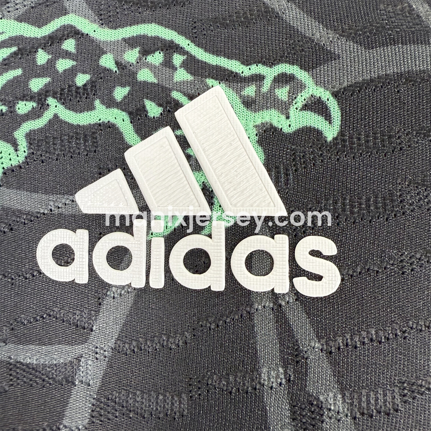 ManixJersey.com | Real Madrid 25-26 Green Dragon Soars Black Jersey - Player Version -Customize Name, Number and Patch | Worldwide Shipping