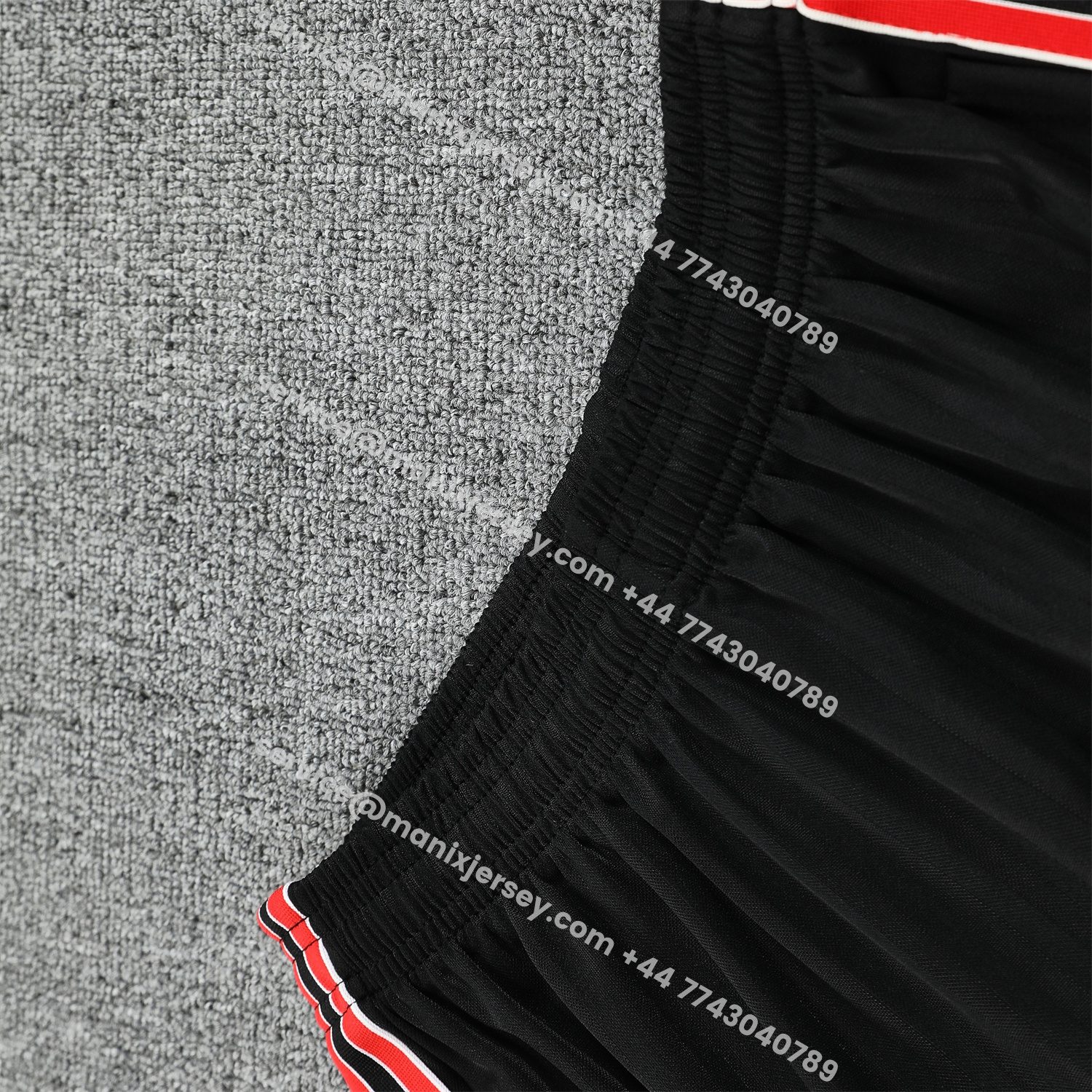ManixJersey.com | Manchester United 25-26 Short-Sleeve Training Set - Red Lines Black Top & Black Shorts -Customize Name, Number and Patch | Worldwide Shipping