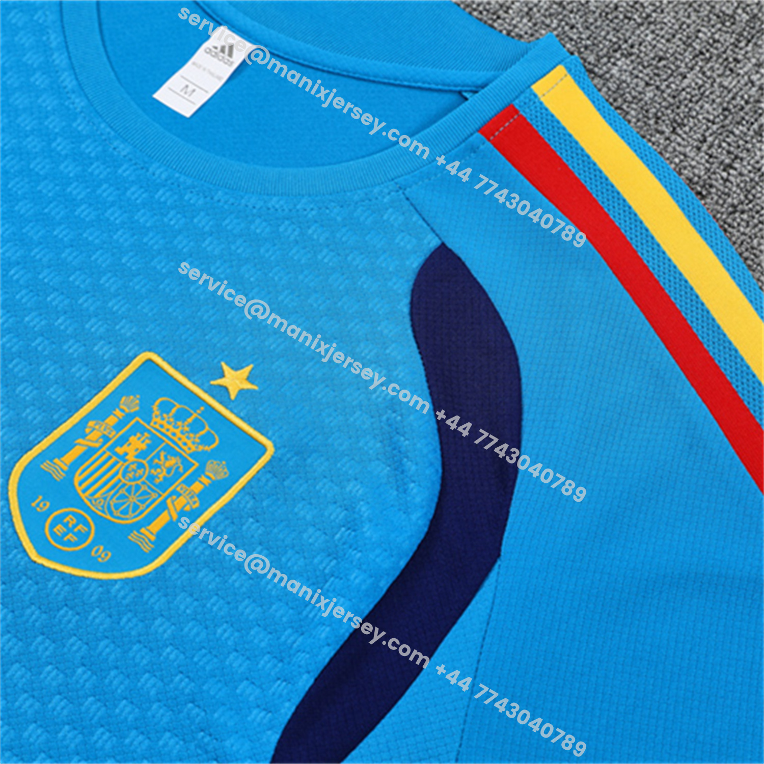 ManixJersey.com | Spain 2026 Short-Sleeve Training Set - Lake Blue Top & Shorts -Customize Name, Number and Patch | Worldwide Shipping