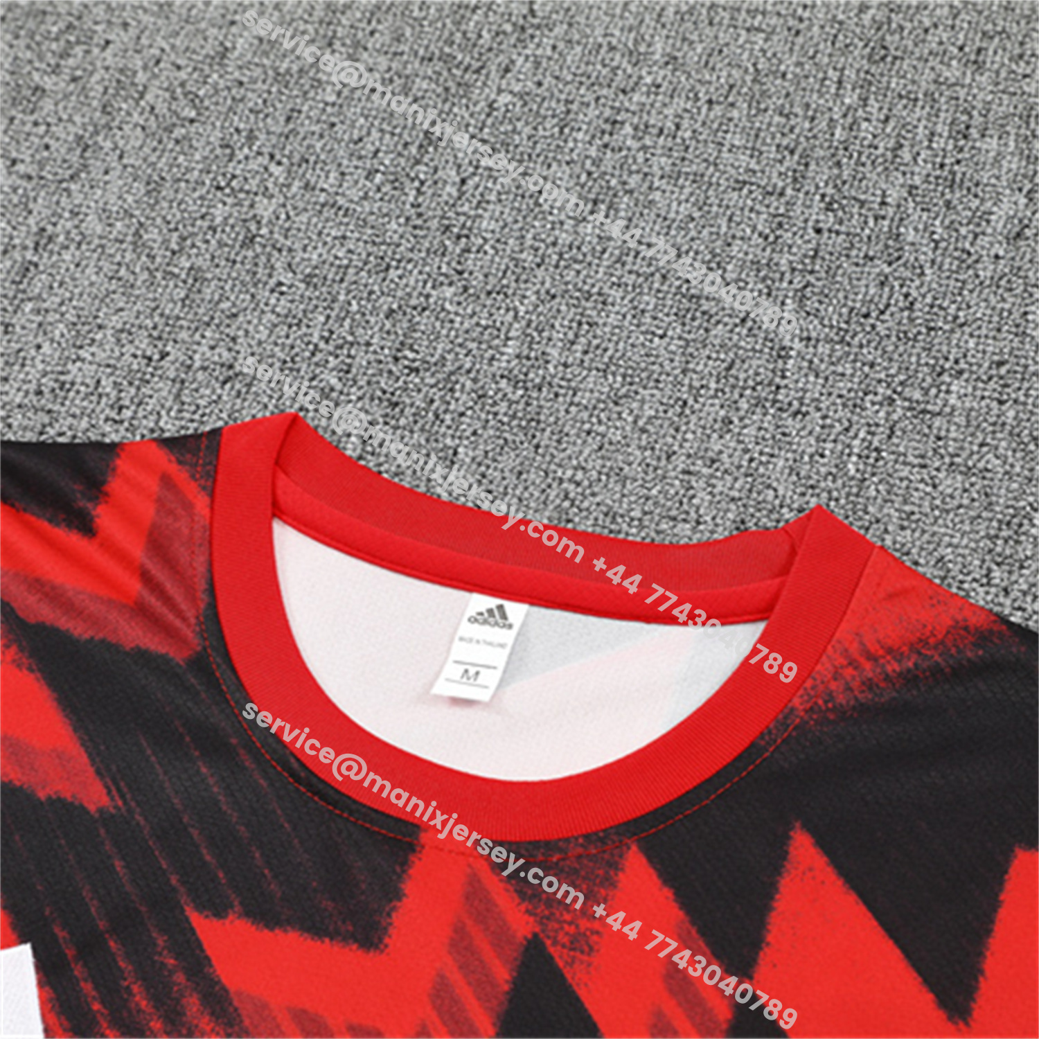 ManixJersey.com | Manchester United 25-26 Short-Sleeve Training Set - Red Camouflage Top & Black Shorts -Customize Name, Number and Patch | Worldwide Shipping