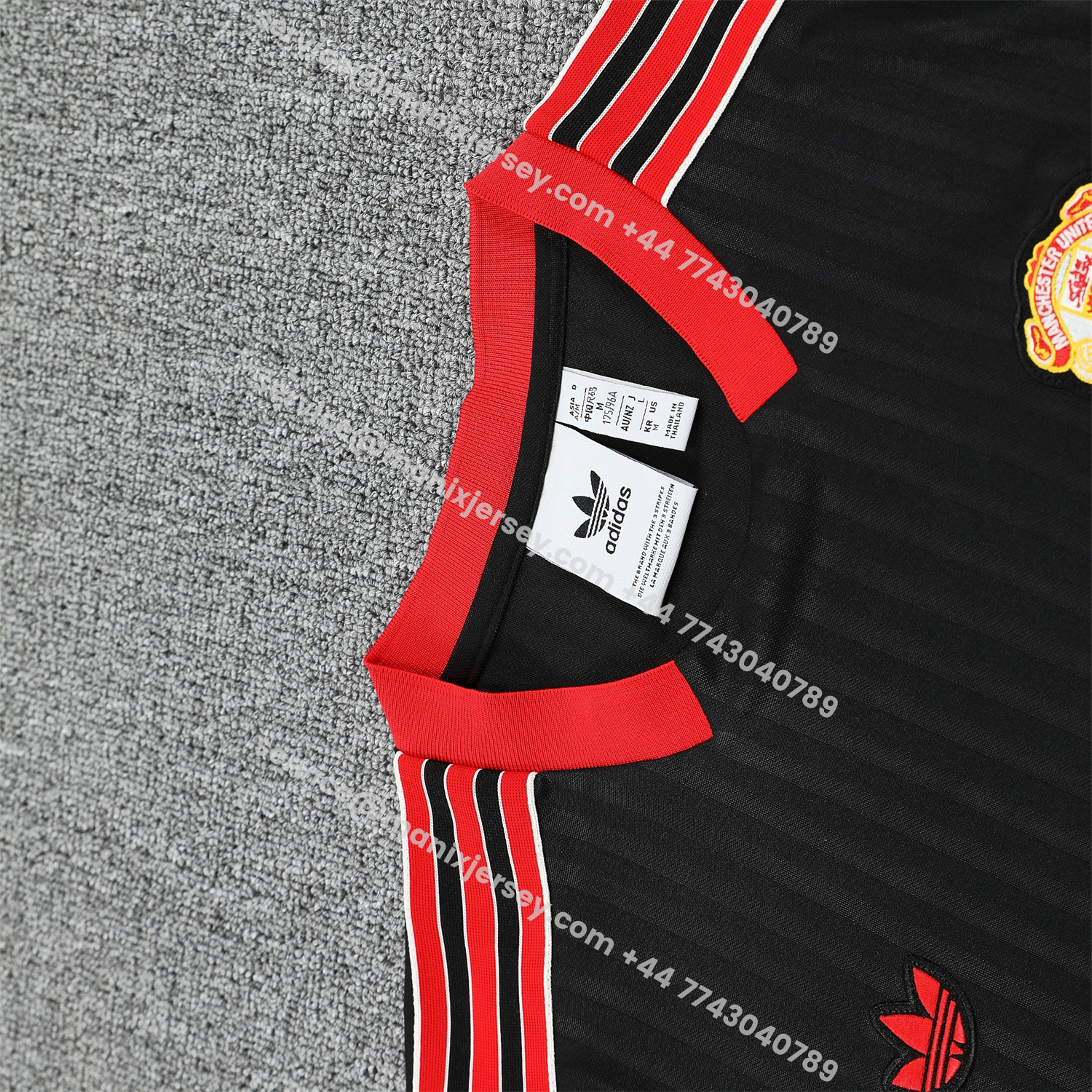 ManixJersey.com | Manchester United 25-26 Vest Training Set - Red Retro Logo Black Vest & Black Shorts -Customize Name, Number and Patch | Worldwide Shipping