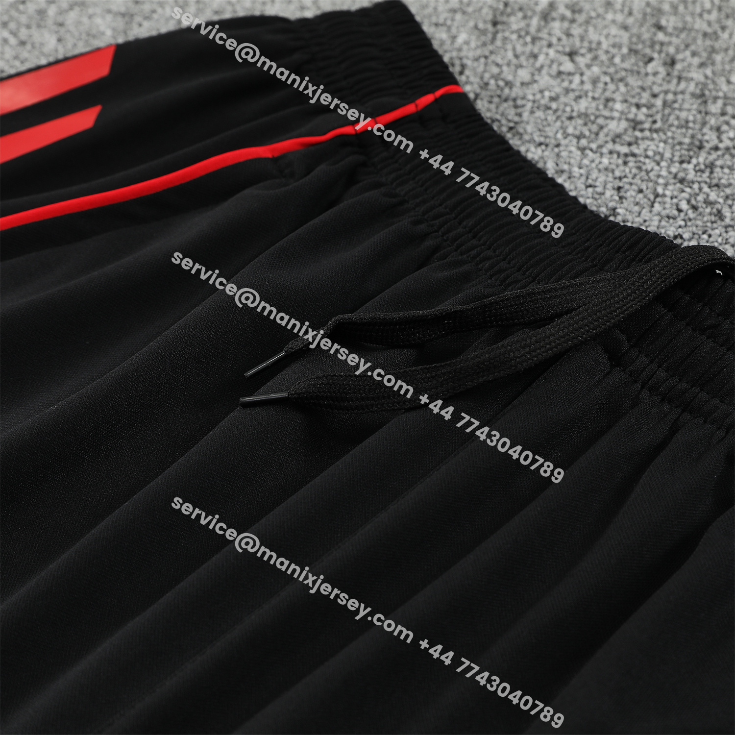 ManixJersey.com | Manchester United 25-26 Short-Sleeve Training Set - Red Black Blocks White Top & Black Shorts -Customize Name, Number and Patch | Worldwide Shipping
