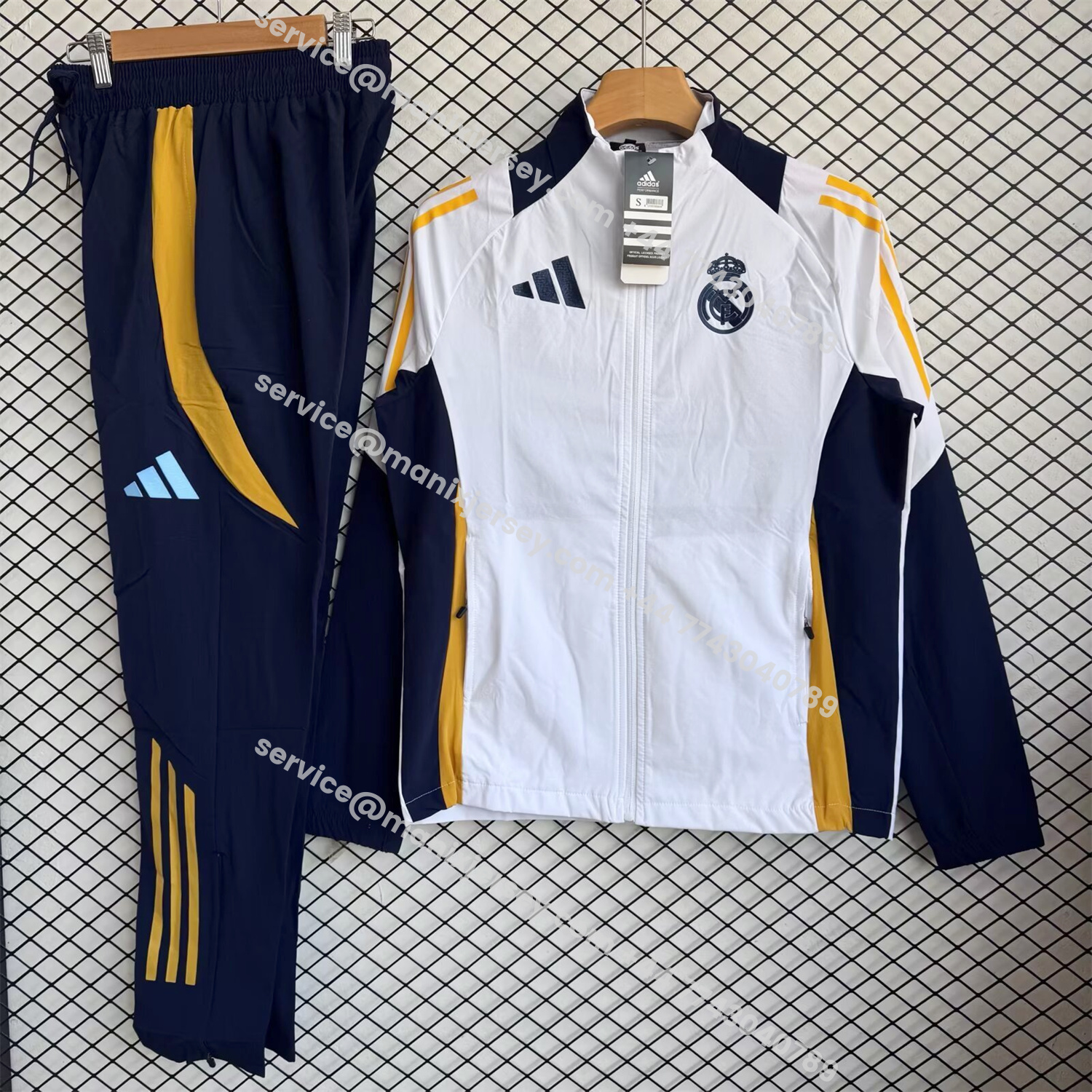 ManixJersey.com | Real Madrid 25-26 Windbreaker Training Set - White Top and Black Pants -Customize Name, Number and Patch | Worldwide Shipping