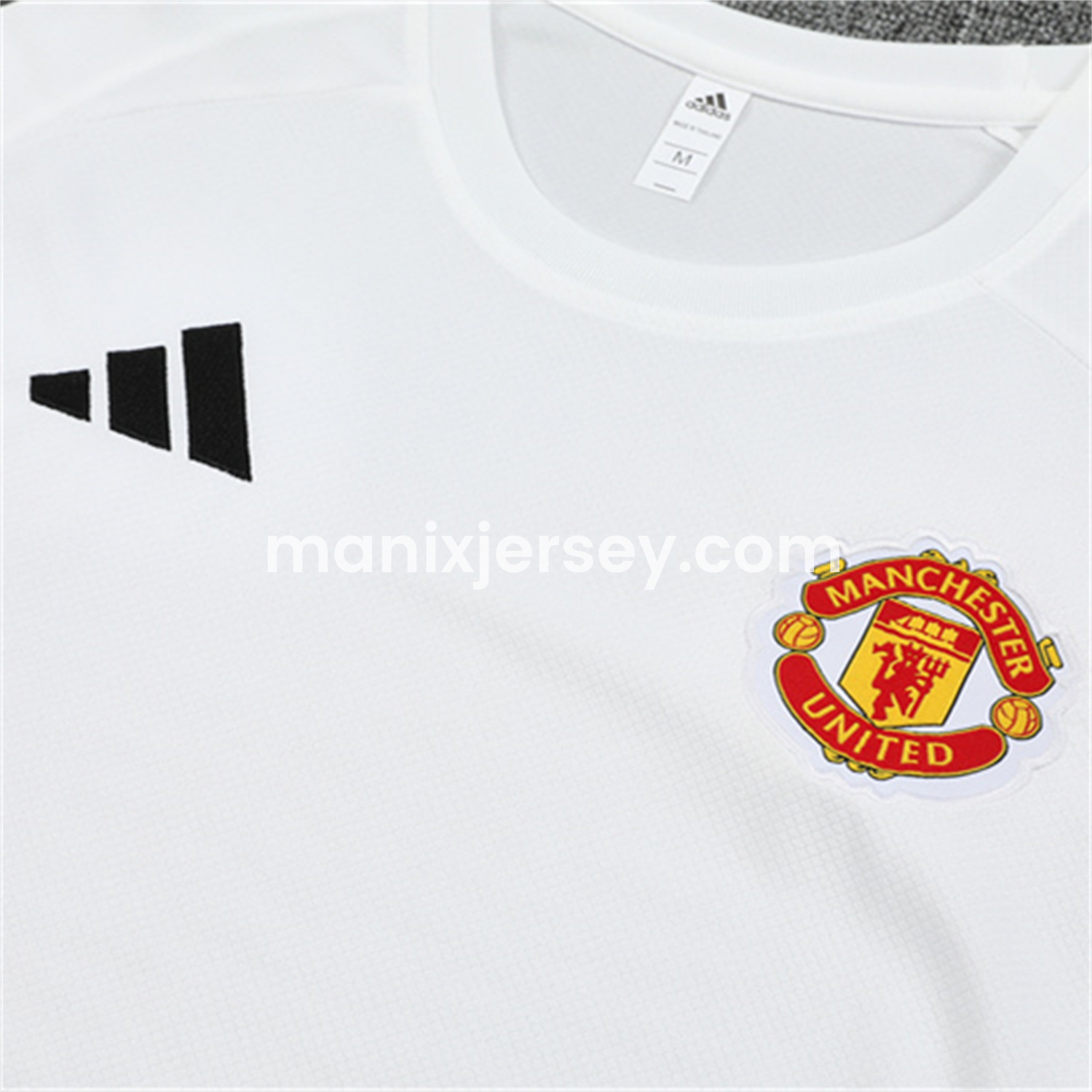 ManixJersey.com | Manchester United 25-26 Kid Short-Sleeve Training Set - White Top & Black Shorts -Customize Name, Number and Patch | Worldwide Shipping