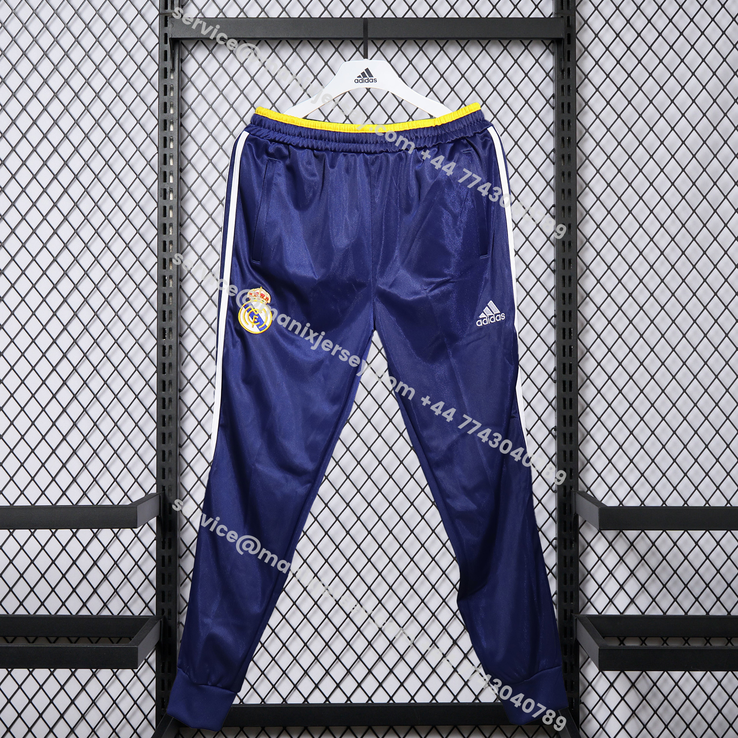ManixJersey.com | Real Madrid 25-26 Pure Color Yellow Lines Training Set - Dark Blue Top and Dark Blue Pants -Customize Name, Number and Patch | Worldwide Shipping