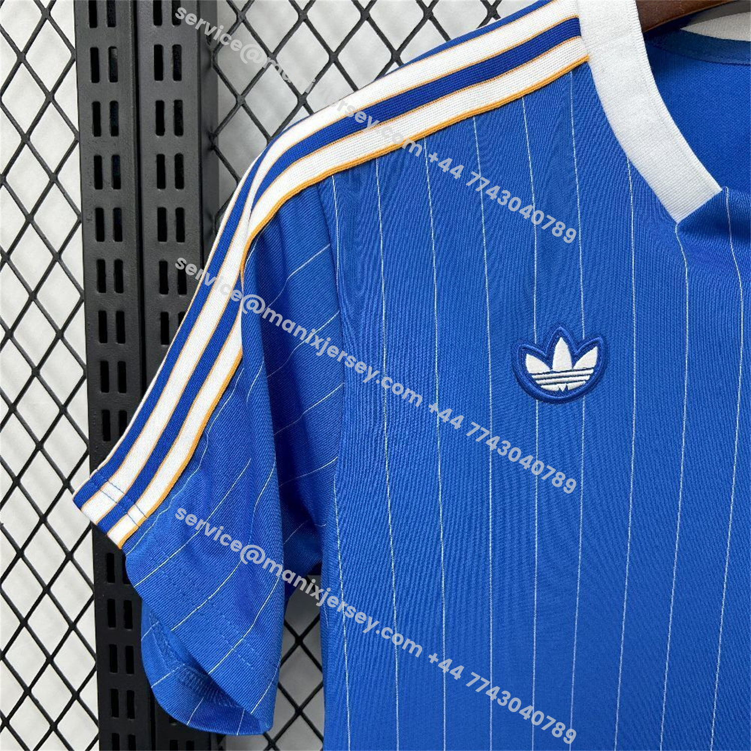 ManixJersey.com | Real Madrid 25-26 Trefoil White Lines Blue Travel Jersey - Fans Version -Customize Name, Number and Patch | Worldwide Shipping