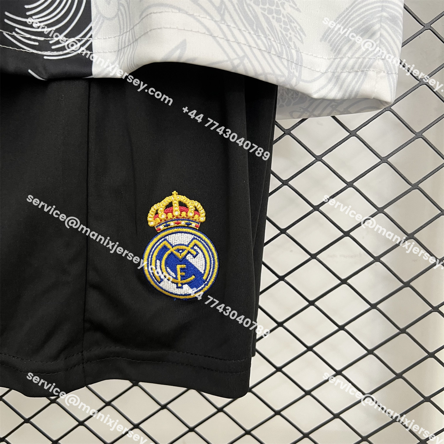 ManixJersey.com | Real Madrid 25-26 Dragon White And Black Special Kids Kit -Customize Name, Number and Patch | Worldwide Shipping