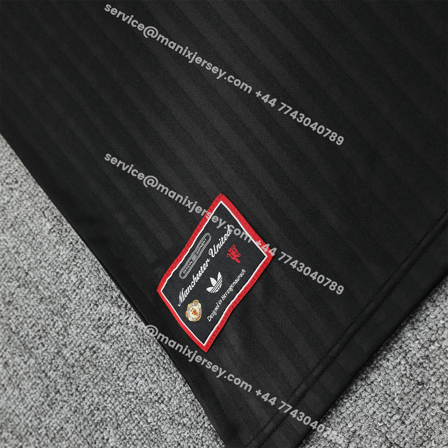 ManixJersey.com | Manchester United 25-26 Short-Sleeve Training Set - Red Lines Black Top & Black Shorts -Customize Name, Number and Patch | Worldwide Shipping