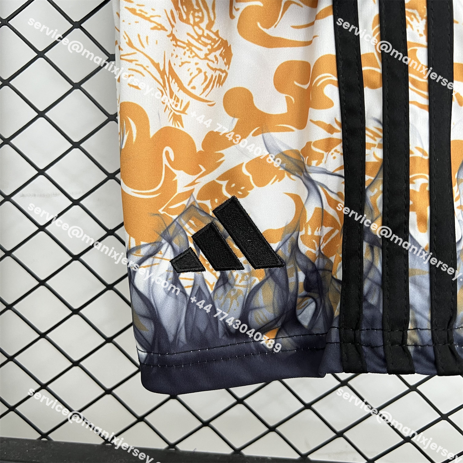 ManixJersey.com | Real Madrid 25-26 Orange And Black Dragon Special Kids Kit -Customize Name, Number and Patch | Worldwide Shipping