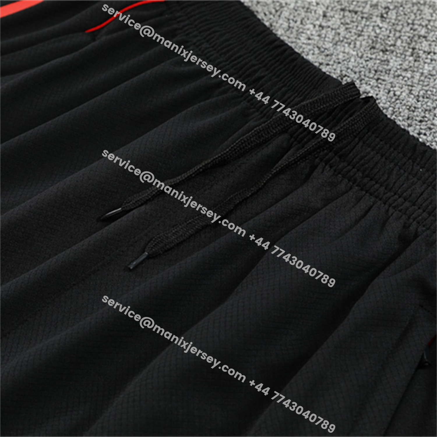 ManixJersey.com | Manchester United 25-26 Short-Sleeve Training Set - Red Camouflage Top & Black Shorts -Customize Name, Number and Patch | Worldwide Shipping