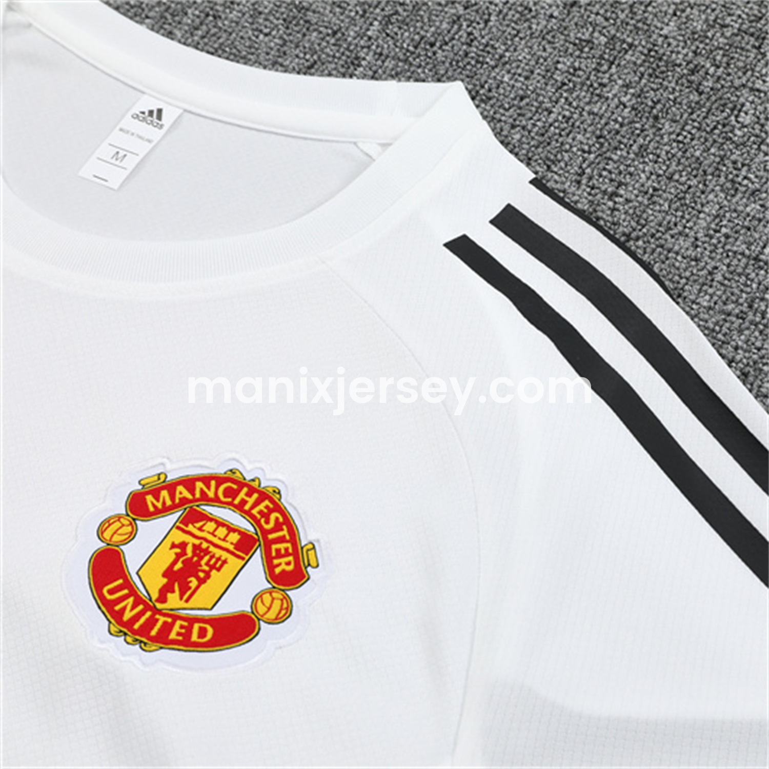 ManixJersey.com | Manchester United 25-26 Kid Short-Sleeve Training Set - White Top & Black Shorts -Customize Name, Number and Patch | Worldwide Shipping