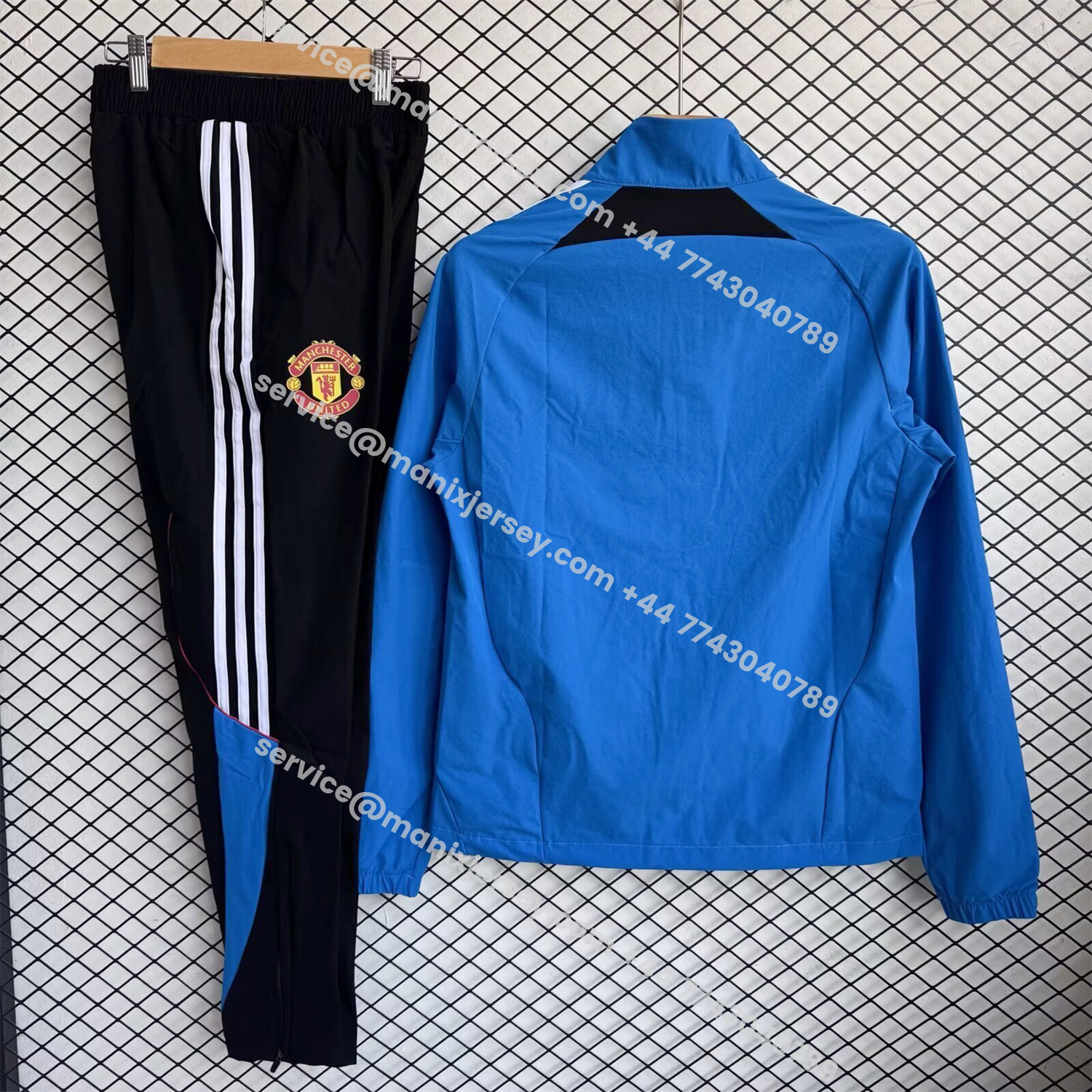 ManixJersey.com | Manchester United 25-26 Windbreaker Training Set - Blue Top and Black Pants -Customize Name, Number and Patch | Worldwide Shipping