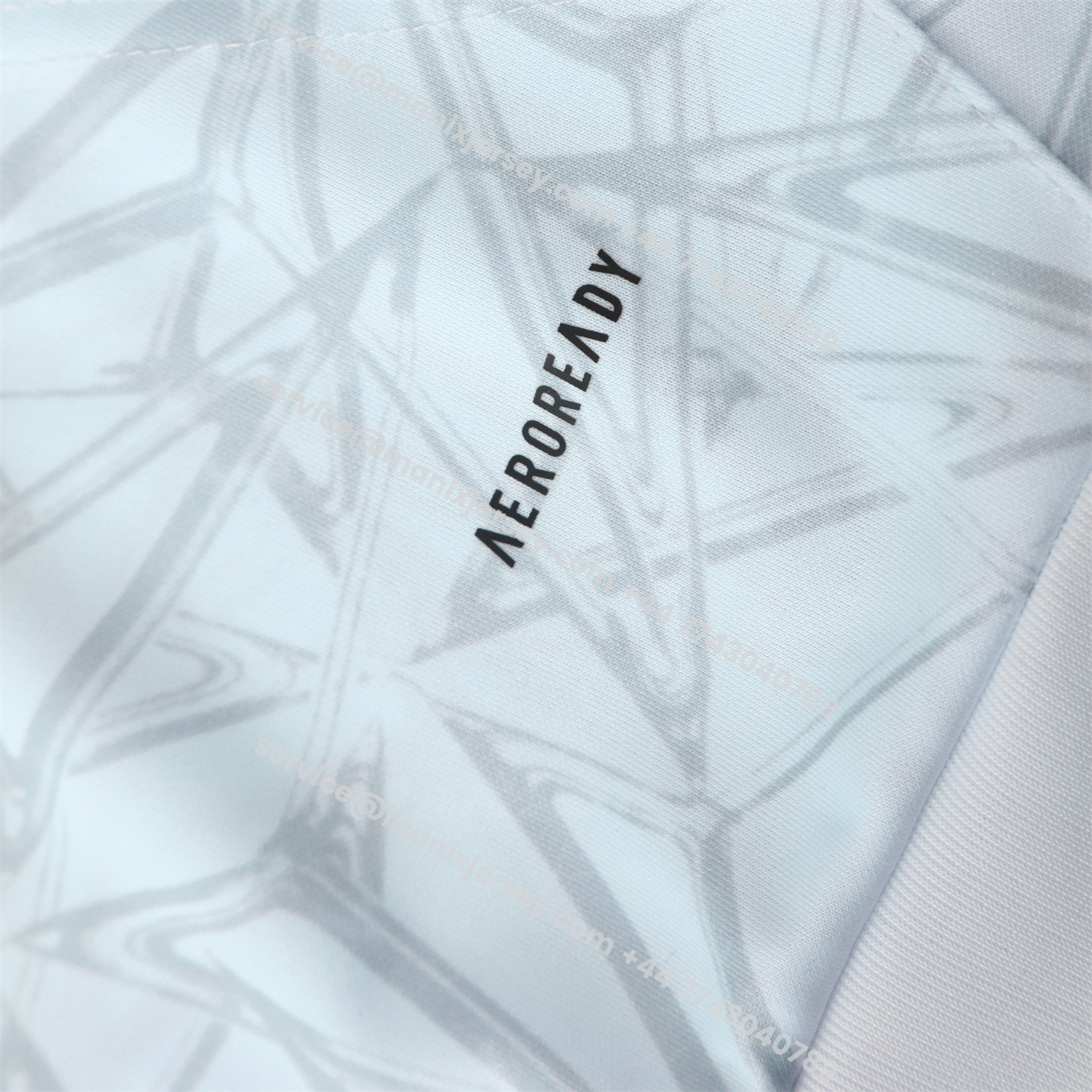 ManixJersey.com | Real Madrid 25-26 Traning Hoodie Set - Triangular Spots White Hoodie With Black Pants -Customize Name, Number and Patch | Worldwide Shipping