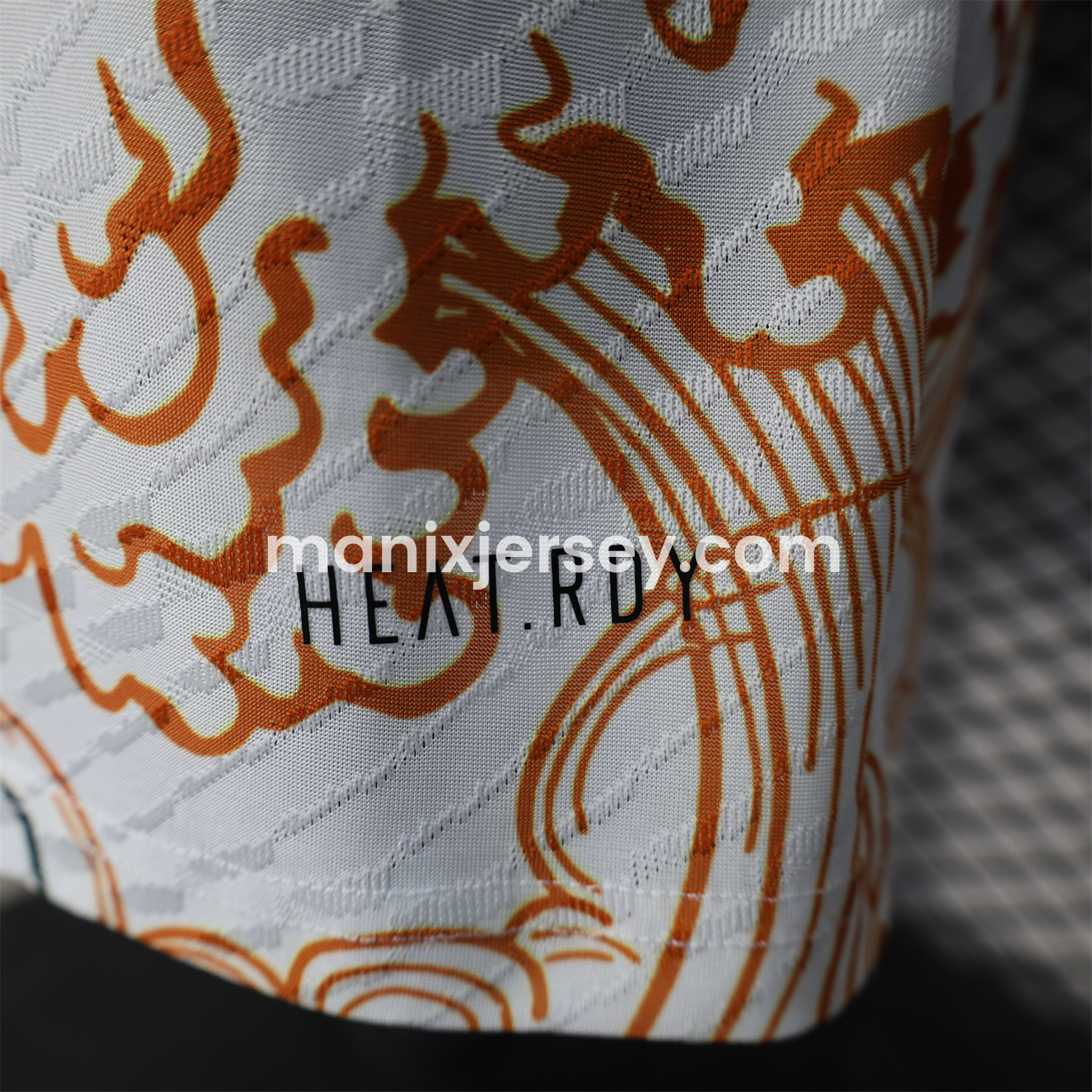 ManixJersey.com | Real Madrid 24-25 Black & Orange Loong White Jersey - Player Version -Customize Name, Number and Patch | Worldwide Shipping