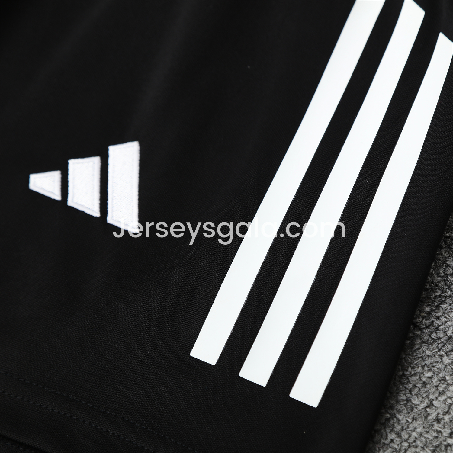 JerseysGala.com | Real Madrid 25-26 Short-Sleeve Training Set - Blue Black Dragon Top & Black-White Shorts -Customize Name, Number and Patch | Worldwide Shipping