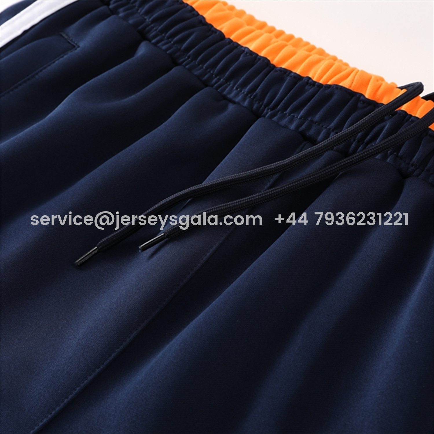 JerseysGala.com | Real Madrid 25-26 Jacket Training Tracksuit - Royal Blue Jackets & Pants with Orange Lines -Customize Name, Number and Patch | Worldwide Shipping