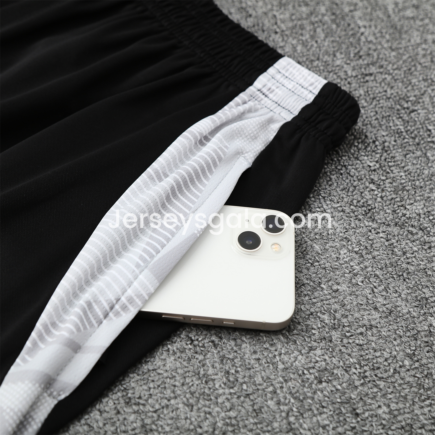 JerseysGala.com | Real Madrid 25-26 Short-Sleeve Training Set - Pink-Black Dragon Top & Black-White Shorts -Customize Name, Number and Patch | Worldwide Shipping