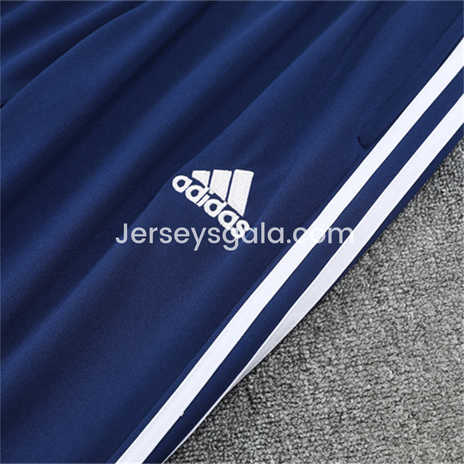 JerseysGala.com | Real Madrid 25-26 Long Sleeve Training Set - Green Line White Top and Blue Pants -Customize Name, Number and Patch | Worldwide Shipping