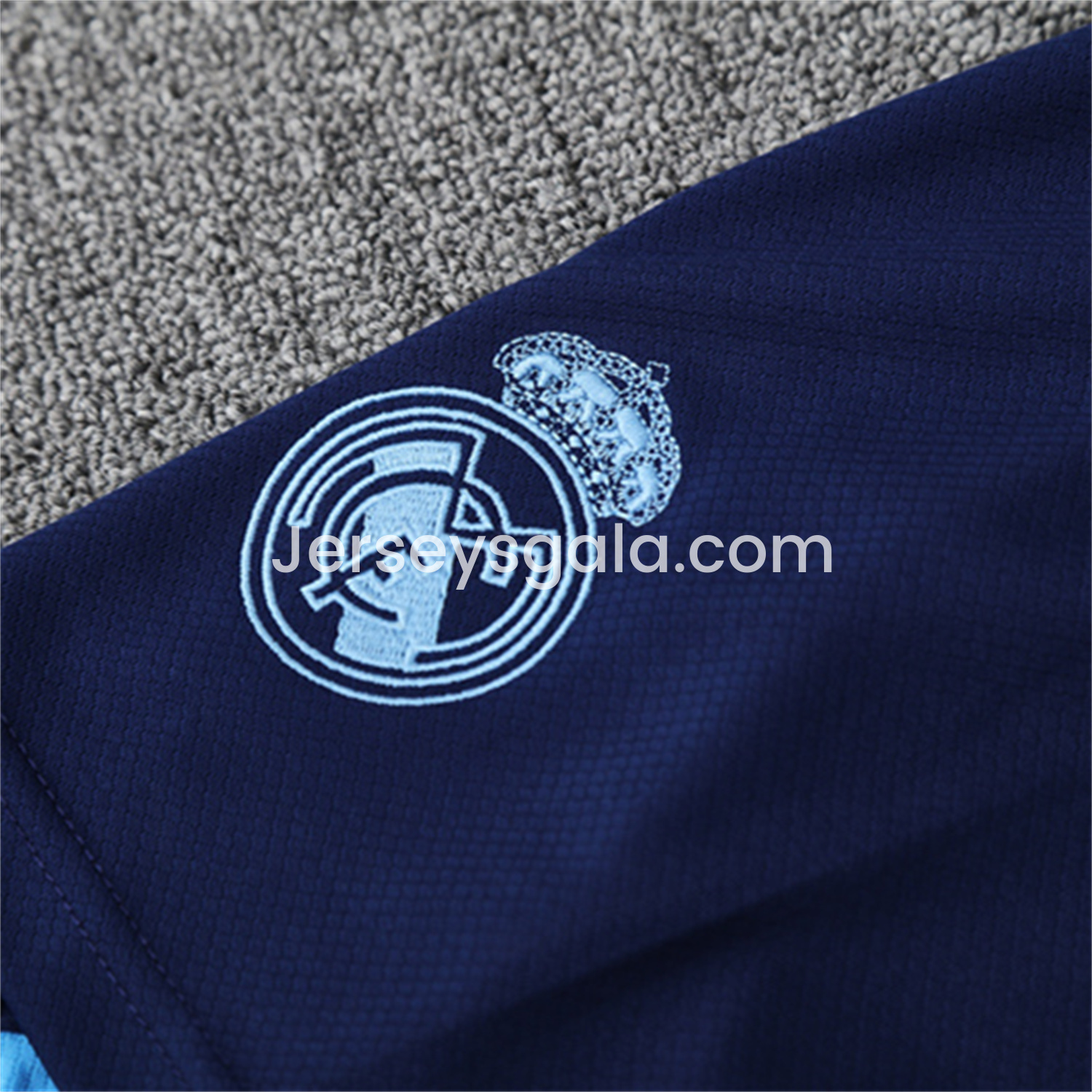 JerseysGala.com | Real Madrid 25-26 Pre-Match Kids Short-Sleeve Training Set - Blue-Gray Camouflage Top and Blue Shorts -Customize Name, Number and Patch | Worldwide Shipping