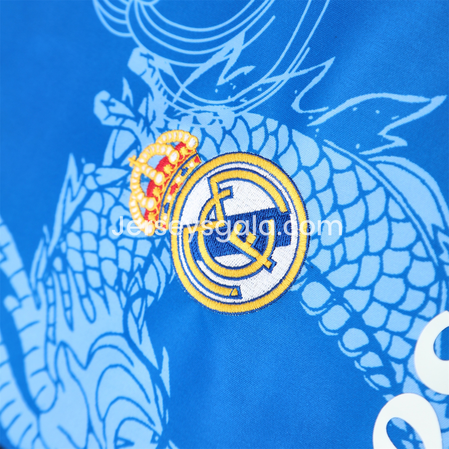 JerseysGala.com | Real Madrid 25-26 Short-Sleeve Training Set - Blue Black Dragon Top & Black-White Shorts -Customize Name, Number and Patch | Worldwide Shipping