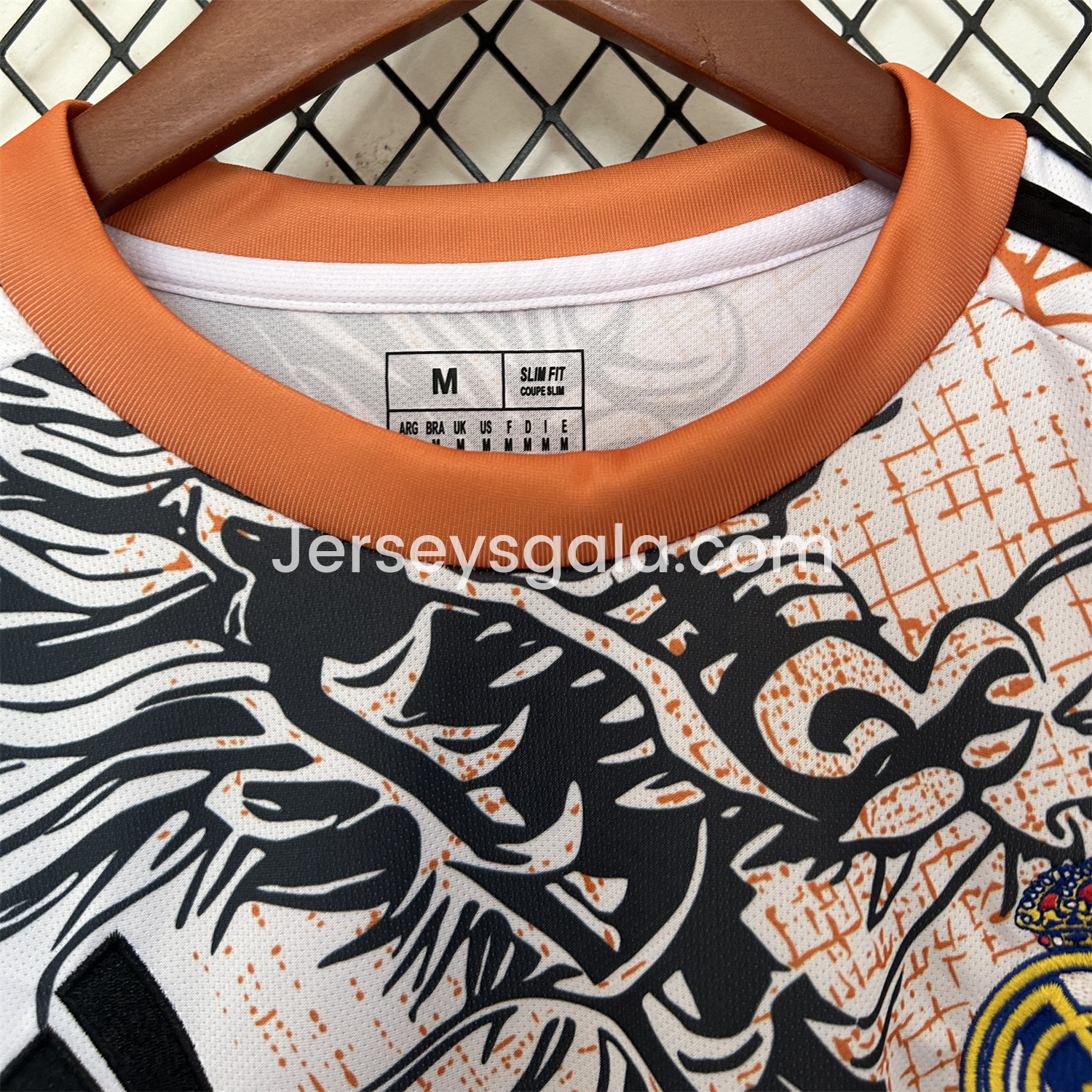 JerseysGala.com | Real Madrid 25-26 Black Dragon Orange Dragon White Special Edition Jersey - Fans Version -Customize Name, Number and Patch | Worldwide Shipping
