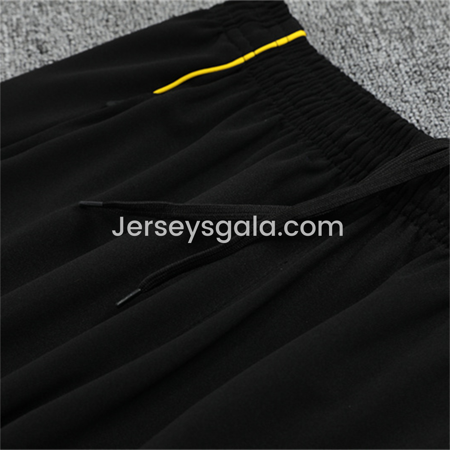 JerseysGala.com | Real Madrid 25-26 Long Sleeve Training Set - Yellow Line White Top and Black Shorts -Customize Name, Number and Patch | Worldwide Shipping