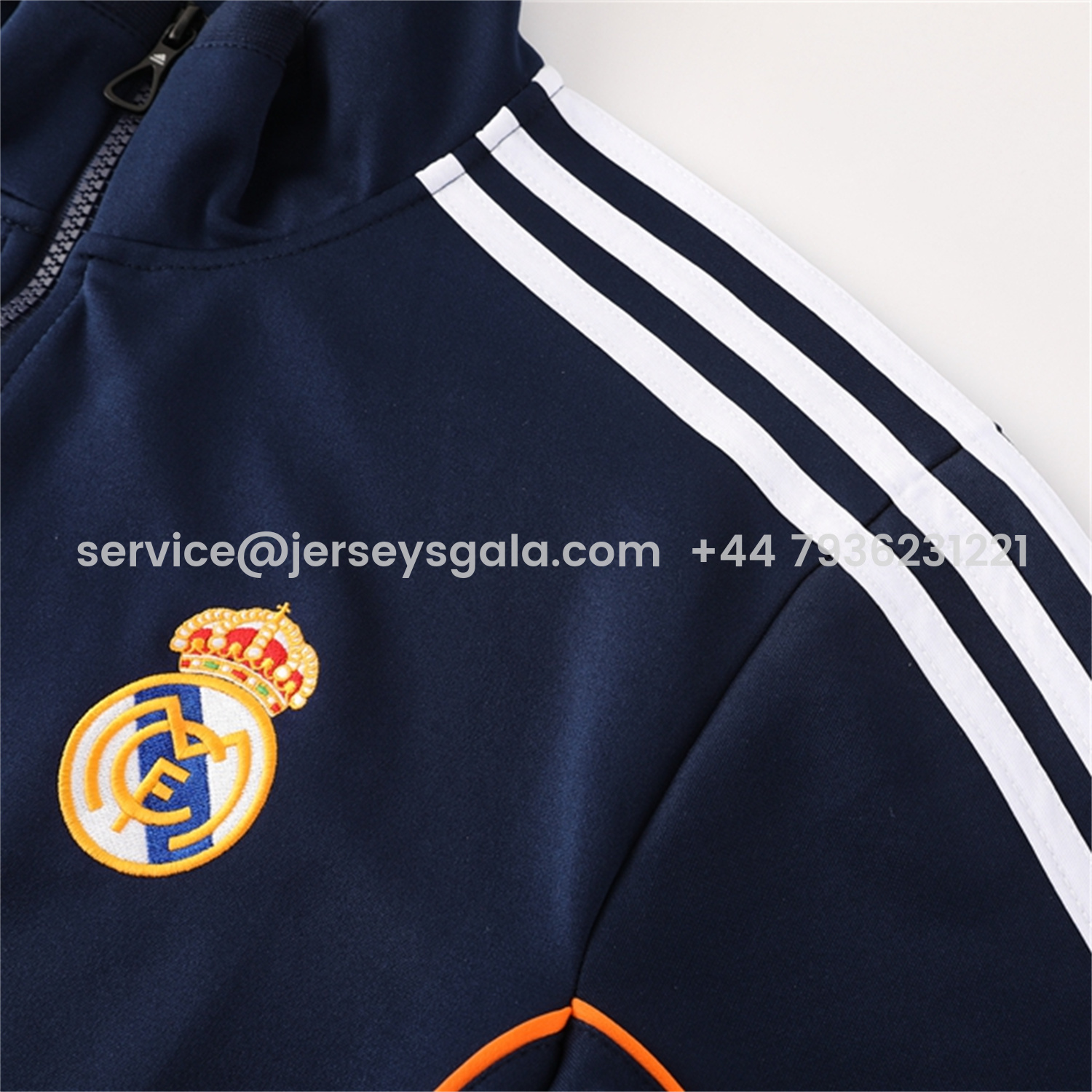 JerseysGala.com | Real Madrid 25-26 Jacket Training Tracksuit - Royal Blue Jackets & Pants with Orange Lines -Customize Name, Number and Patch | Worldwide Shipping