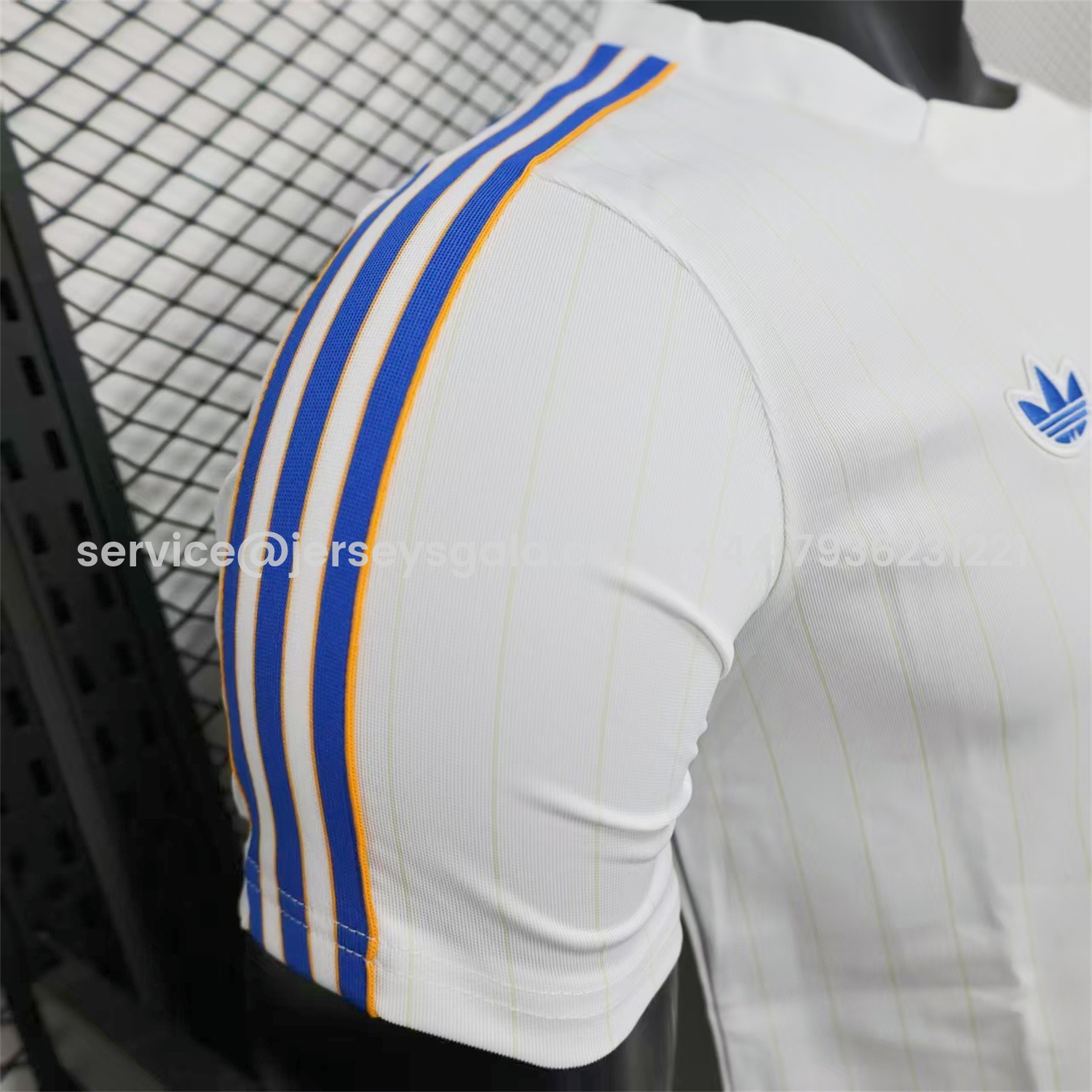 JerseysGala.com | Real Madrid 25-26 Trefoil Blue Lines White Travel Jersey - Player Version -Customize Name, Number and Patch | Worldwide Shipping