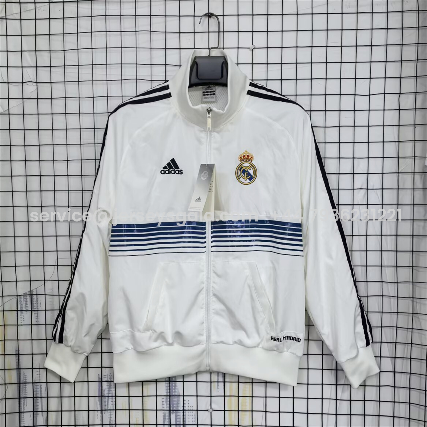 JerseysGala.com | Real Madrid 25-26 Windbreaker Jacket - White With Black Lines -Customize Name, Number and Patch | Worldwide Shipping