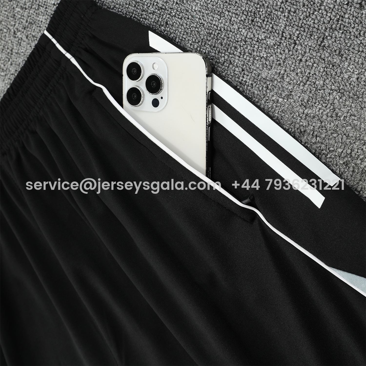 JerseysGala.com | Real Madrid 25-26 Short-Sleeve Training Set - Grey Arrow Pattern Top & Black Shorts -Customize Name, Number and Patch | Worldwide Shipping