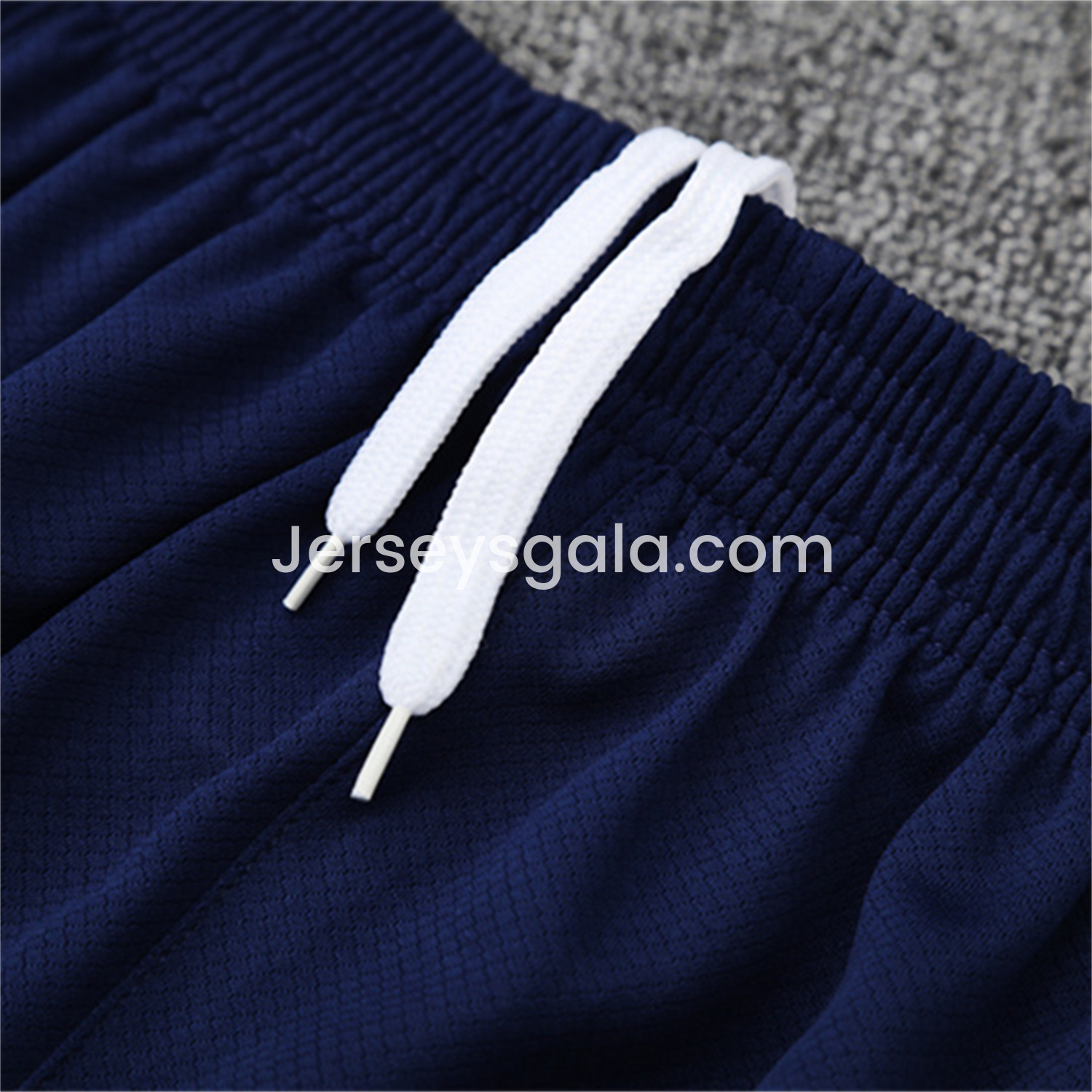 JerseysGala.com | Real Madrid 25-26 Pre-Match Short-Sleeve Training Set - Blue-Gray Camouflage Top and Blue Shorts -Customize Name, Number and Patch | Worldwide Shipping
