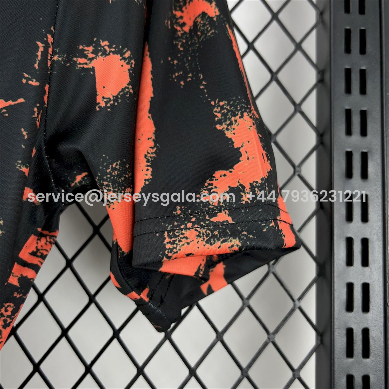 JerseysGala.com | Newcastle United 25-26 Orange Red Graffiti Black Pre-Match Training Jersey - Fans Version -Customize Name, Number and Patch | Worldwide Shipping
