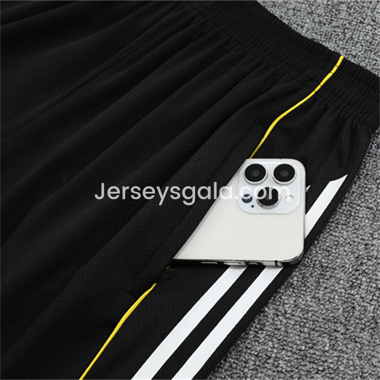 JerseysGala.com | Real Madrid 25-26 Short-Sleeve Training Set - Yellow Line Black Top and Black Shorts -Customize Name, Number and Patch | Worldwide Shipping
