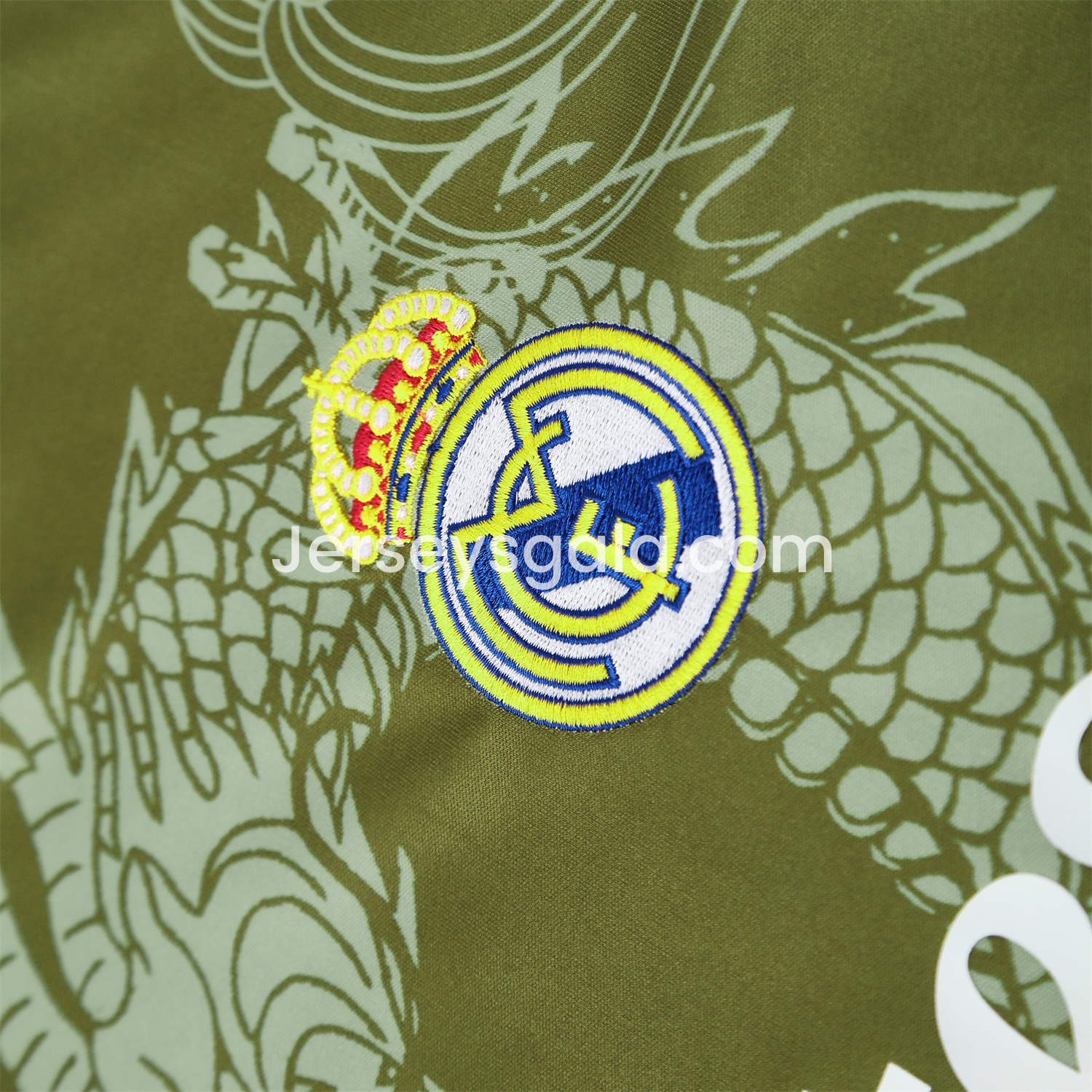JerseysGala.com | Real Madrid 25-26 Short-Sleeve Training Set - Green-Black Dragon Top & Black-White Shorts -Customize Name, Number and Patch | Worldwide Shipping