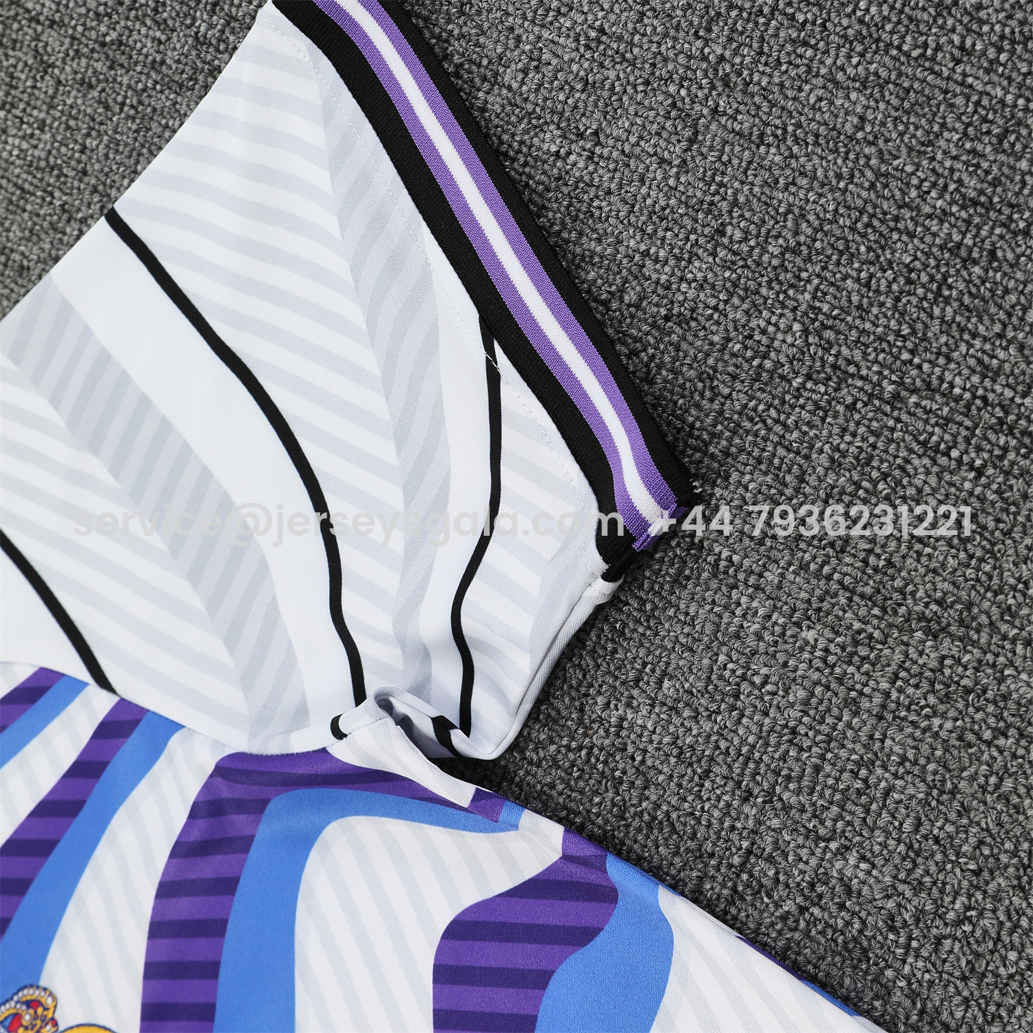 JerseysGala.com | Real Madrid 25-26 Short-Sleeve Training Set - Blue Purple Curve Pattern Top & Black Shorts -Customize Name, Number and Patch | Worldwide Shipping