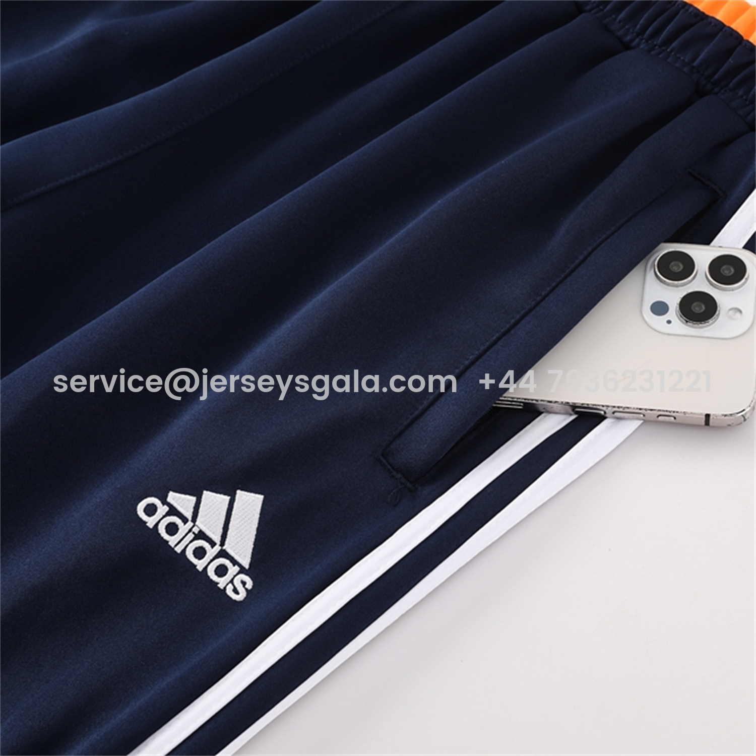 JerseysGala.com | Real Madrid 25-26 Jacket Training Tracksuit - Royal Blue Jackets & Pants with Orange Lines -Customize Name, Number and Patch | Worldwide Shipping