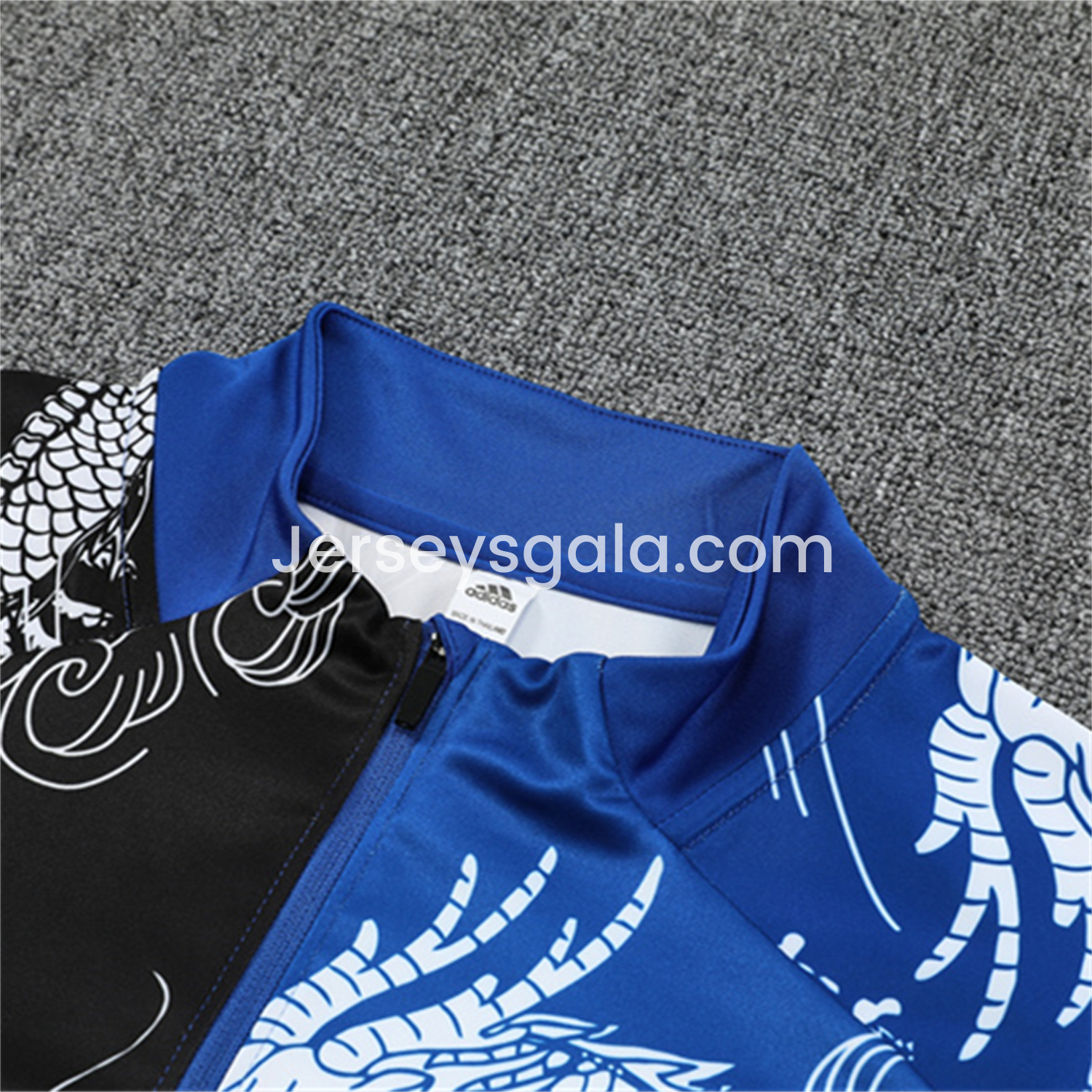JerseysGala.com | Real Madrid 25-26 Long Sleeve Training Set - White Loong Black Blue Top and Black Pants -Customize Name, Number and Patch | Worldwide Shipping