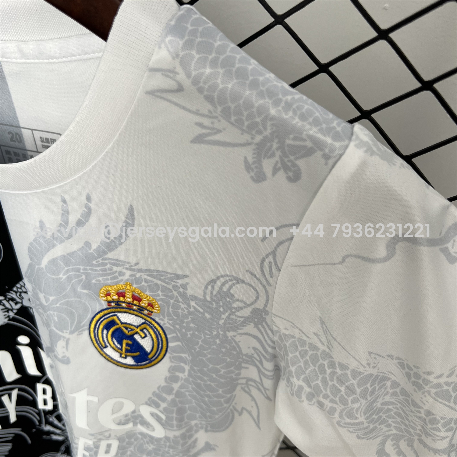 JerseysGala.com | Real Madrid 25-26 Dragon White And Black Special Kids Kit -Customize Name, Number and Patch | Worldwide Shipping