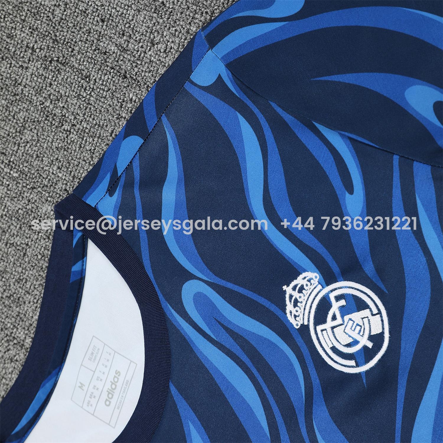 JerseysGala.com | Real Madrid 25-26 Short-Sleeve Training Set - Blue Water Pattern Top & Deep Blue Shorts -Customize Name, Number and Patch | Worldwide Shipping