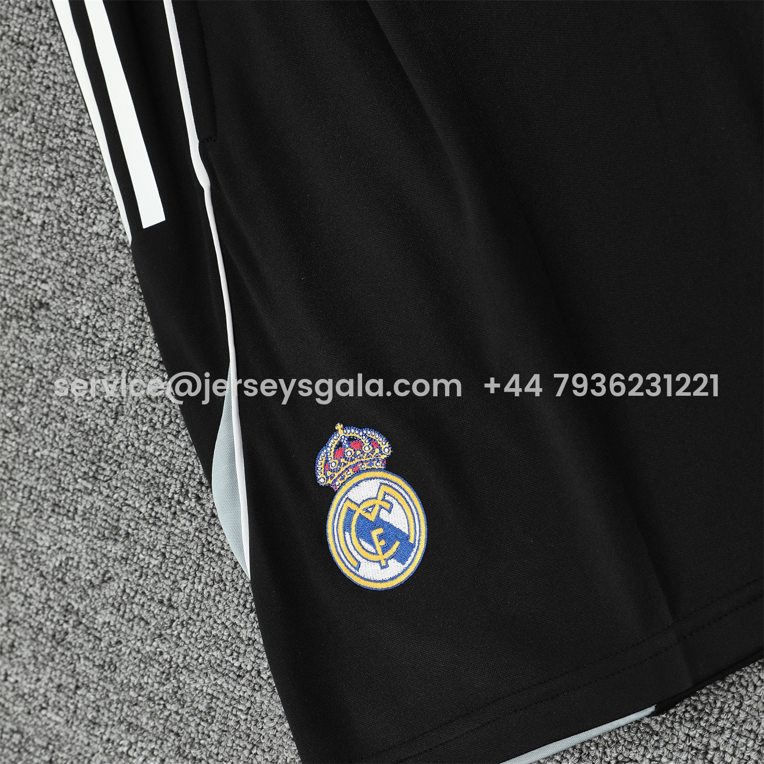 JerseysGala.com | Real Madrid 25-26 Short-Sleeve Training Set - Blue Purple Curve Pattern Top & Black Shorts -Customize Name, Number and Patch | Worldwide Shipping