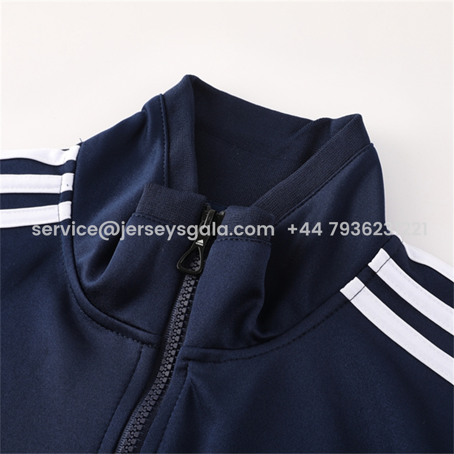 JerseysGala.com | Real Madrid 25-26 Jacket Training Tracksuit - Royal Blue Jackets & Pants with Orange Lines -Customize Name, Number and Patch | Worldwide Shipping