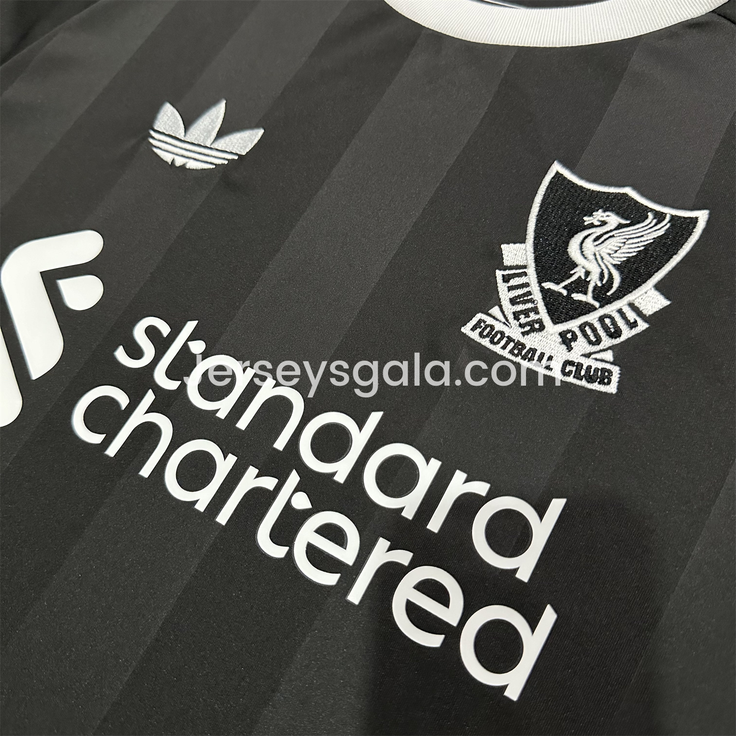 JerseysGala.com | Liver.pool 25-26 Black Trefoil Goalkeeper Jersey - Fans Version -Customize Name, Number and Patch | Worldwide Shipping